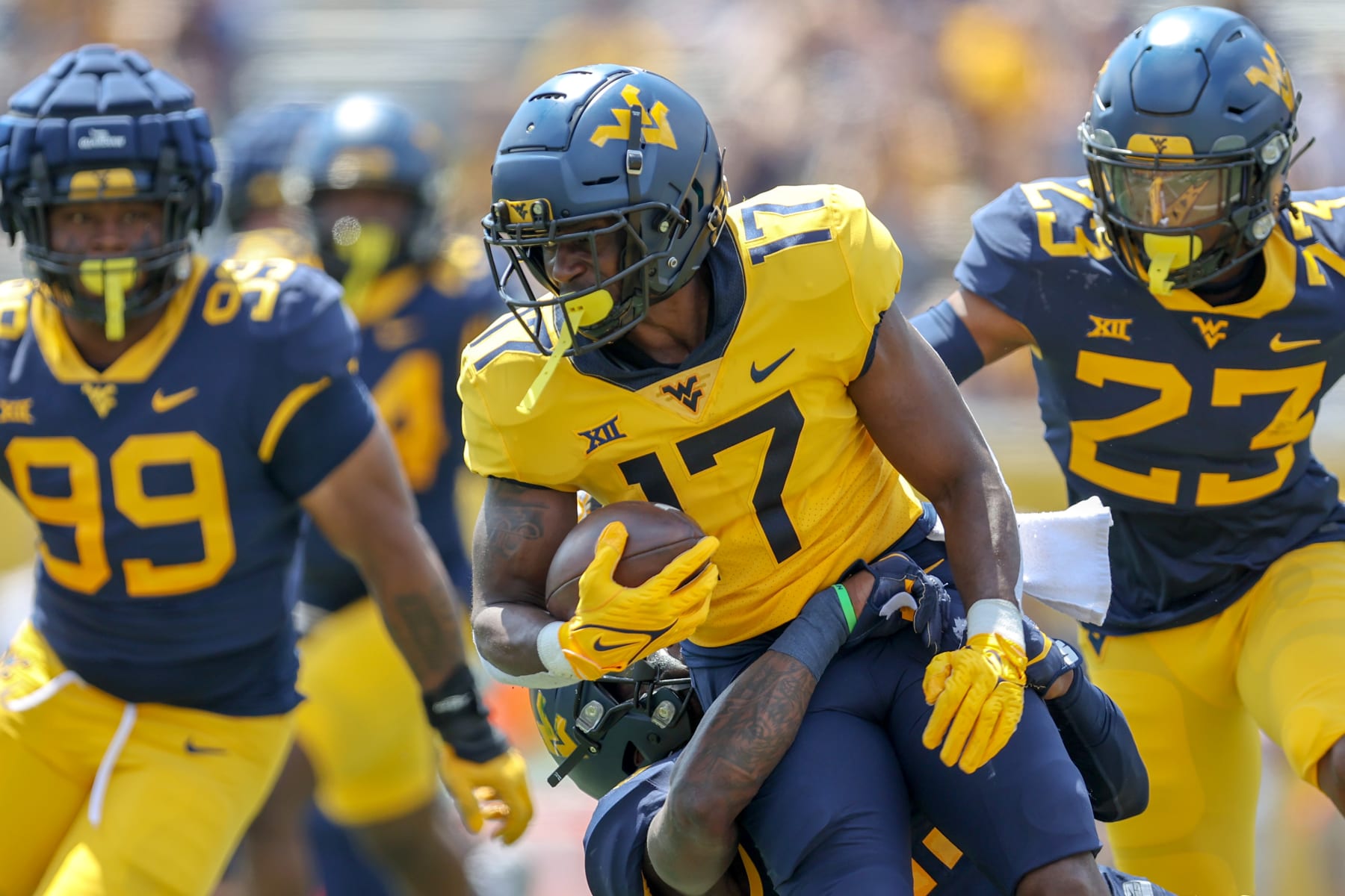 MORGANTOWN, WV - APRIL 23: West Virginia Mountaineers running back Lyn-J Dixon (17) carries the football during the West Virginia Mountaineers college football spring game on April 23, 2022, at Mountaineer Field at Milan Puskar Stadium in Morgantown, WV. (Photo by Frank Jansky/Icon Sportswire via Getty Images)