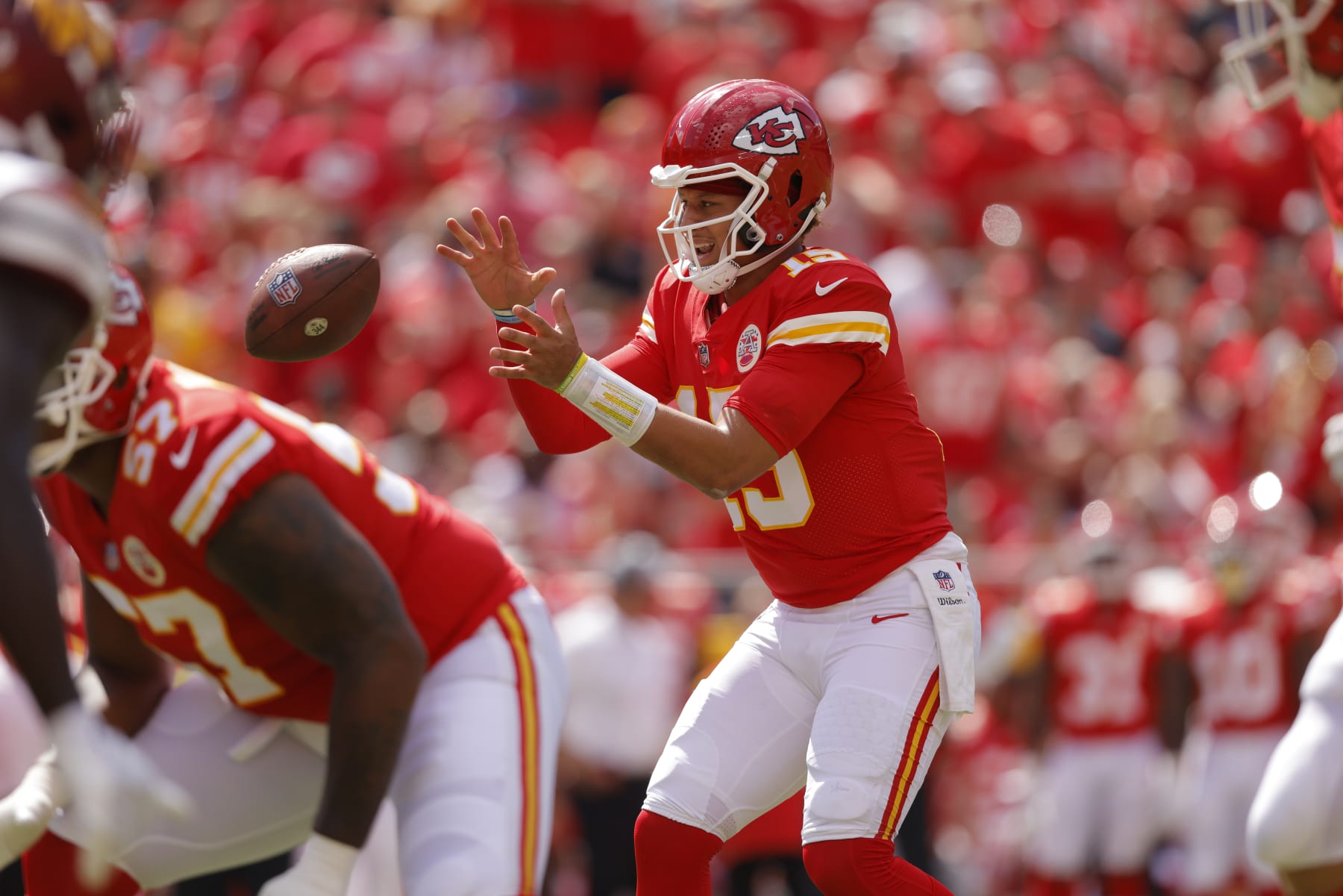 KANSAS CITY, MO - AUGUST 20: Patrick Mahomes #15 of the Kansas City Chiefs takes the snap of the football during the first quarter against the Washington Commanders at Arrowhead Stadium on August 20, 2022 in Kansas City, Missouri. (Photo by David Eulitt/Getty Images)