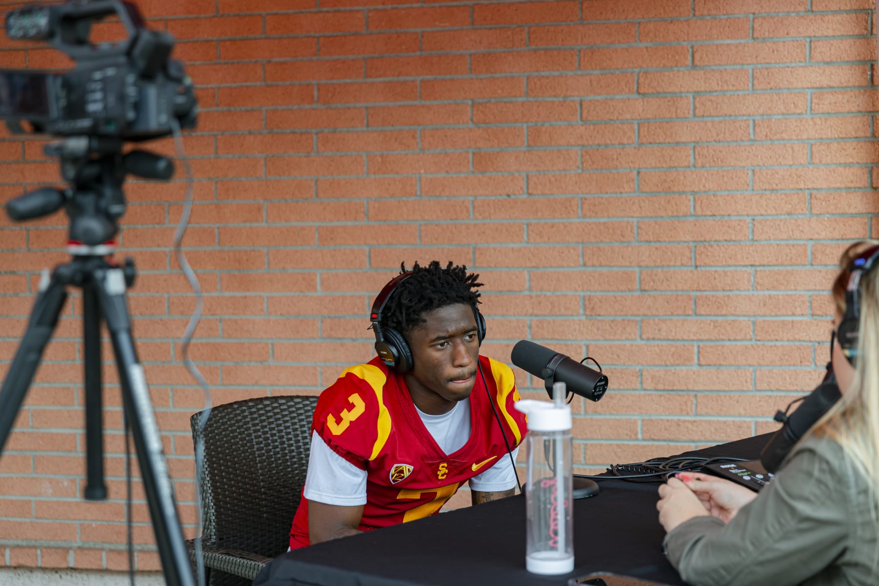 Los Angeles, CA - August 04: USC wide receiver Jordan Addison talks with a podcaster before entering the media day room at University of Southern California on Thursday, Aug. 4, 2022 in Los Angeles, CA. (Wesley Lapointe / Los Angeles Times via Getty Images)