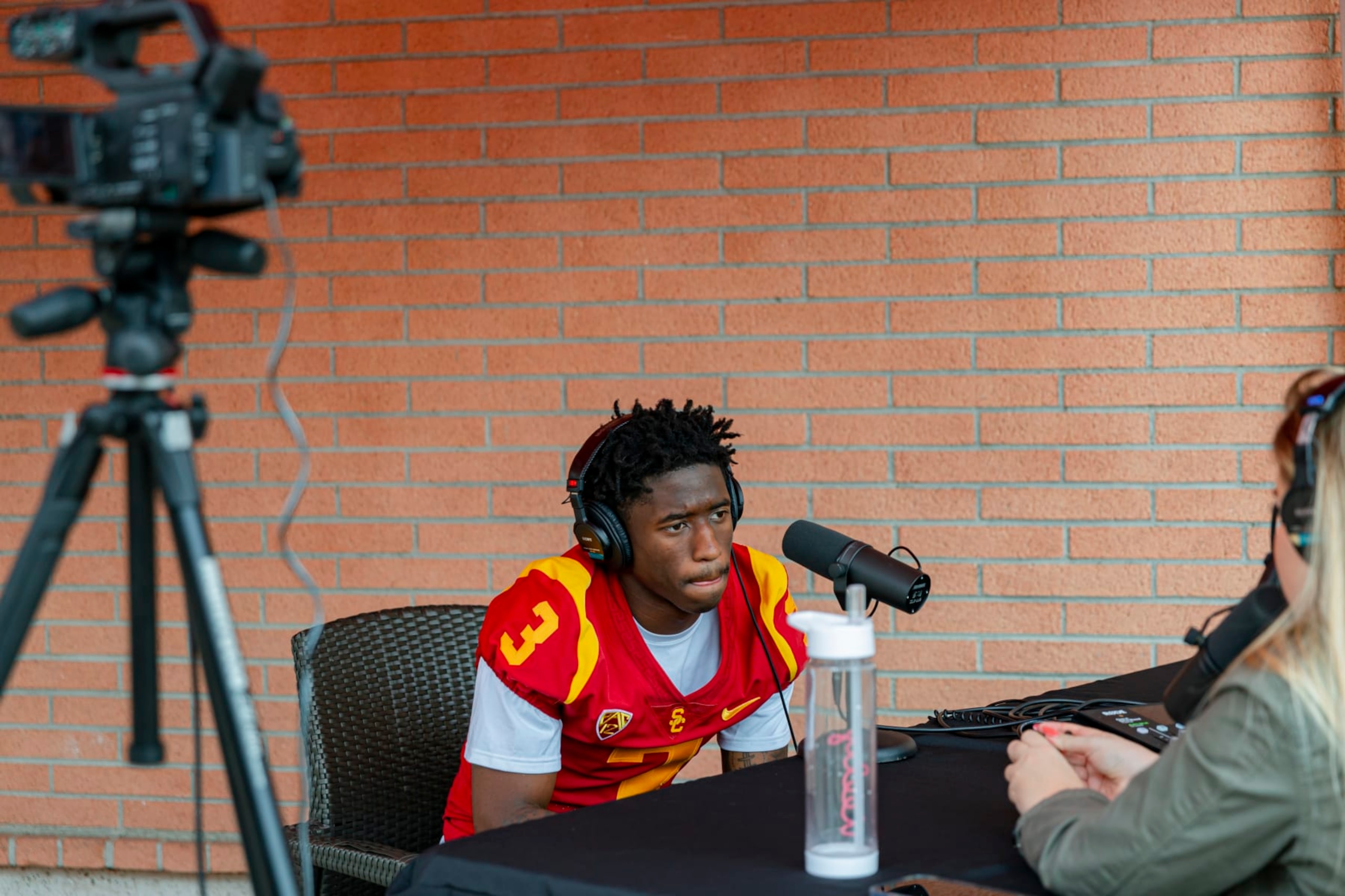 Los Angeles, CA - August 04: USC wide receiver Jordan Addison talks with a podcaster before entering the media day room at University of Southern California on Thursday, Aug. 4, 2022 in Los Angeles, CA. (Wesley Lapointe / Los Angeles Times via Getty Images)