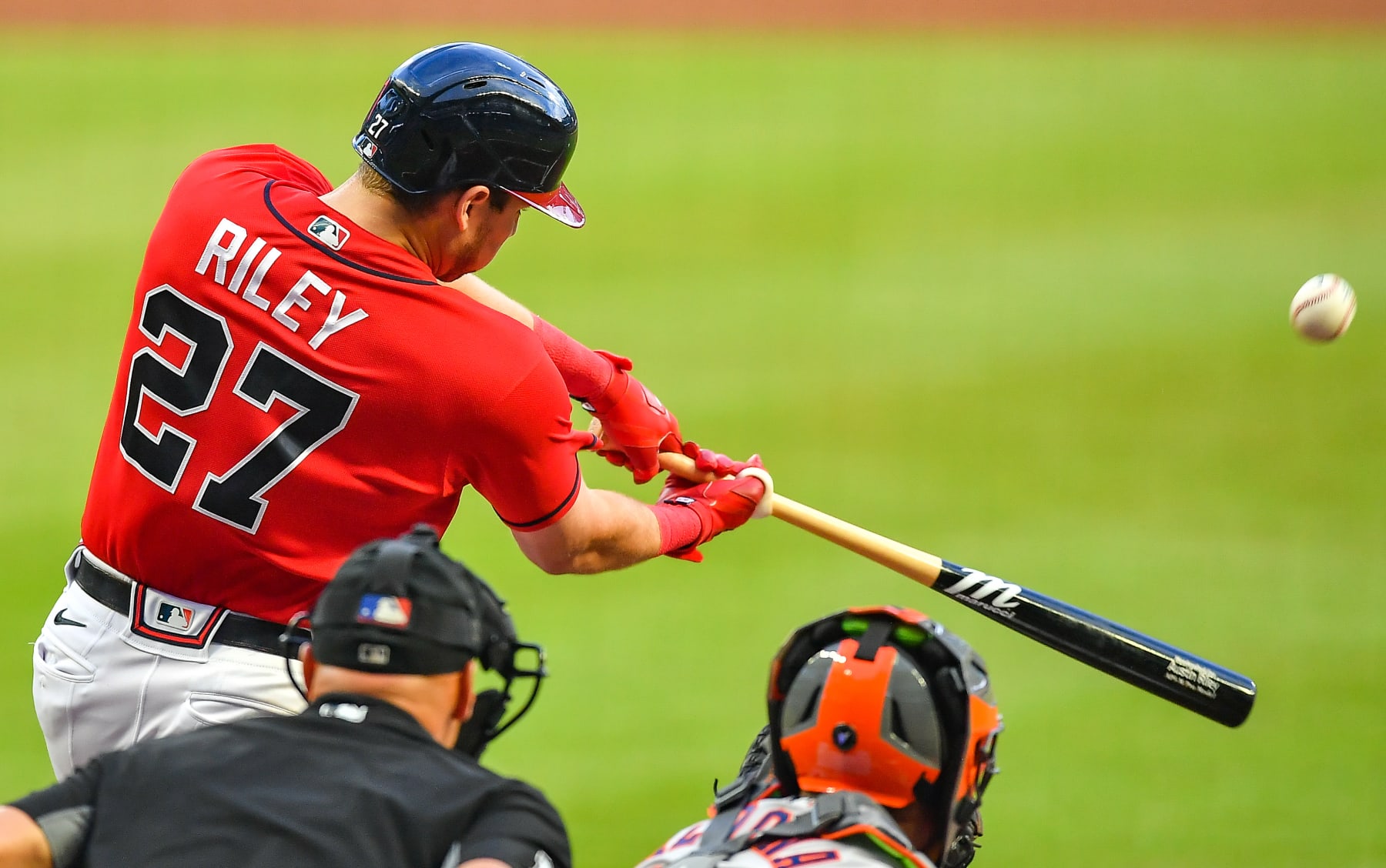 ATLANTA, GA  August 19:  Atlanta third baseman Austin Riley (27) hits the ball deep during the MLB game between the Houston Astros and the Atlanta Braves on August 19th, 2022 at Truist Park in Atlanta, GA. (Photo by Rich von Biberstein/Icon Sportswire via Getty Images)
