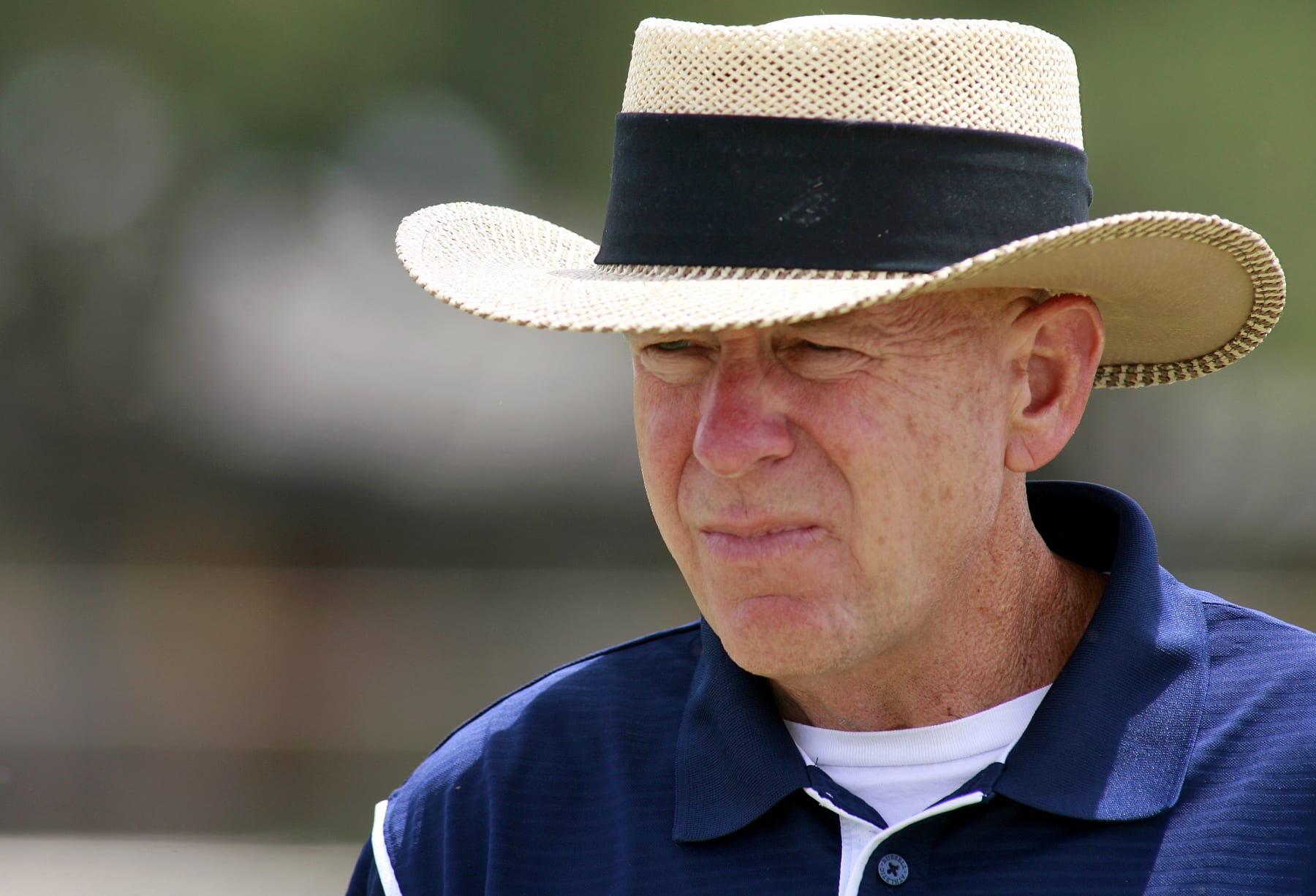 In this photograph taken on Thursday, May 21, 2009, Odessa Permian High School head football coach Gary Gaines walks off the practice field after a workout in Odessa, Texas. Gaines was the head coach of the 1988 Permian football team that was the focus of the H.G. Bissinger book "Friday Night Lights: A Town, a Team and a Dream" and the 2004 motion picture "Friday Night Lights." (AP Photo/Kevin Buehler)
