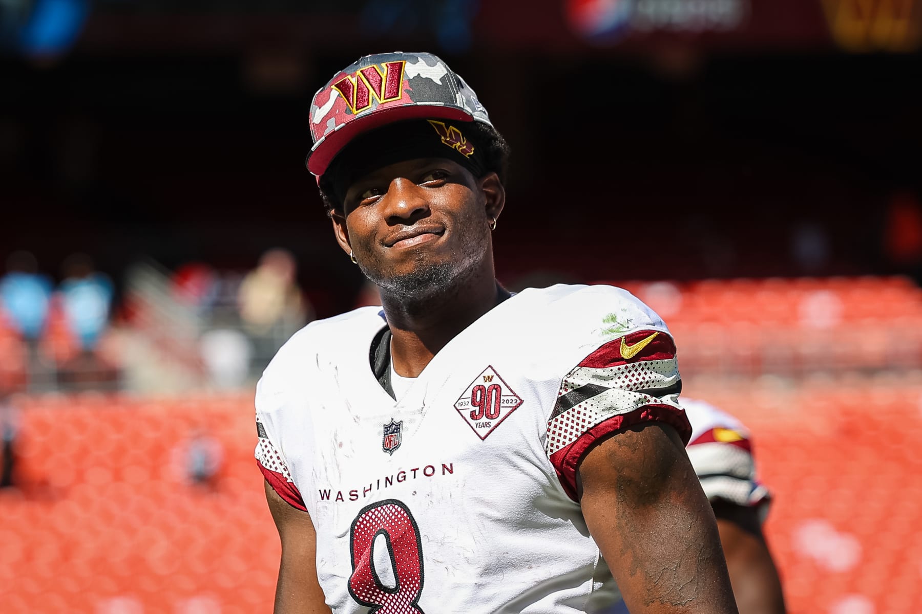 LANDOVER, MD - AUGUST 13: Brian Robinson #8 of the Washington Commanders looks on after the preseason game against the Carolina Panthers at FedExField on August 13, 2022 in Landover, Maryland. (Photo by Scott Taetsch/Getty Images)