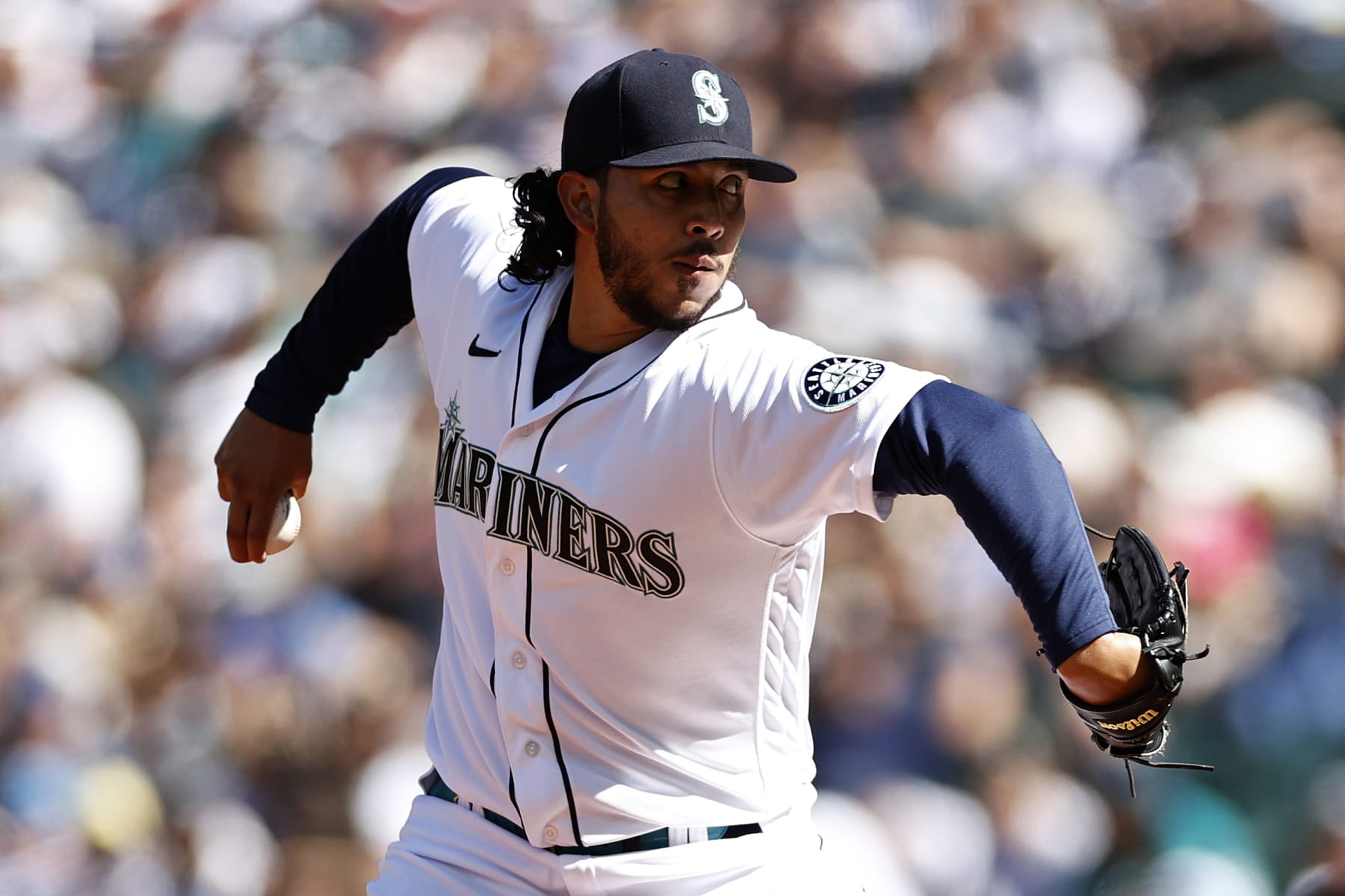 SEATTLE, WASHINGTON - AUGUST 06: Andres Munoz #75 of the Seattle Mariners pitches during the eighth inning against the Los Angeles Angels at T-Mobile Park on August 06, 2022 in Seattle, Washington. (Photo by Steph Chambers/Getty Images)