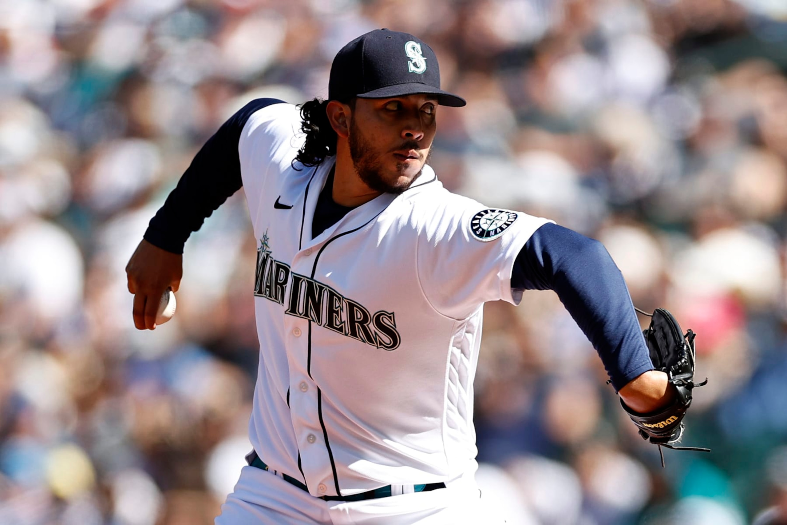SEATTLE, WASHINGTON - AUGUST 06: Andres Munoz #75 of the Seattle Mariners pitches during the eighth inning against the Los Angeles Angels at T-Mobile Park on August 06, 2022 in Seattle, Washington. (Photo by Steph Chambers/Getty Images)