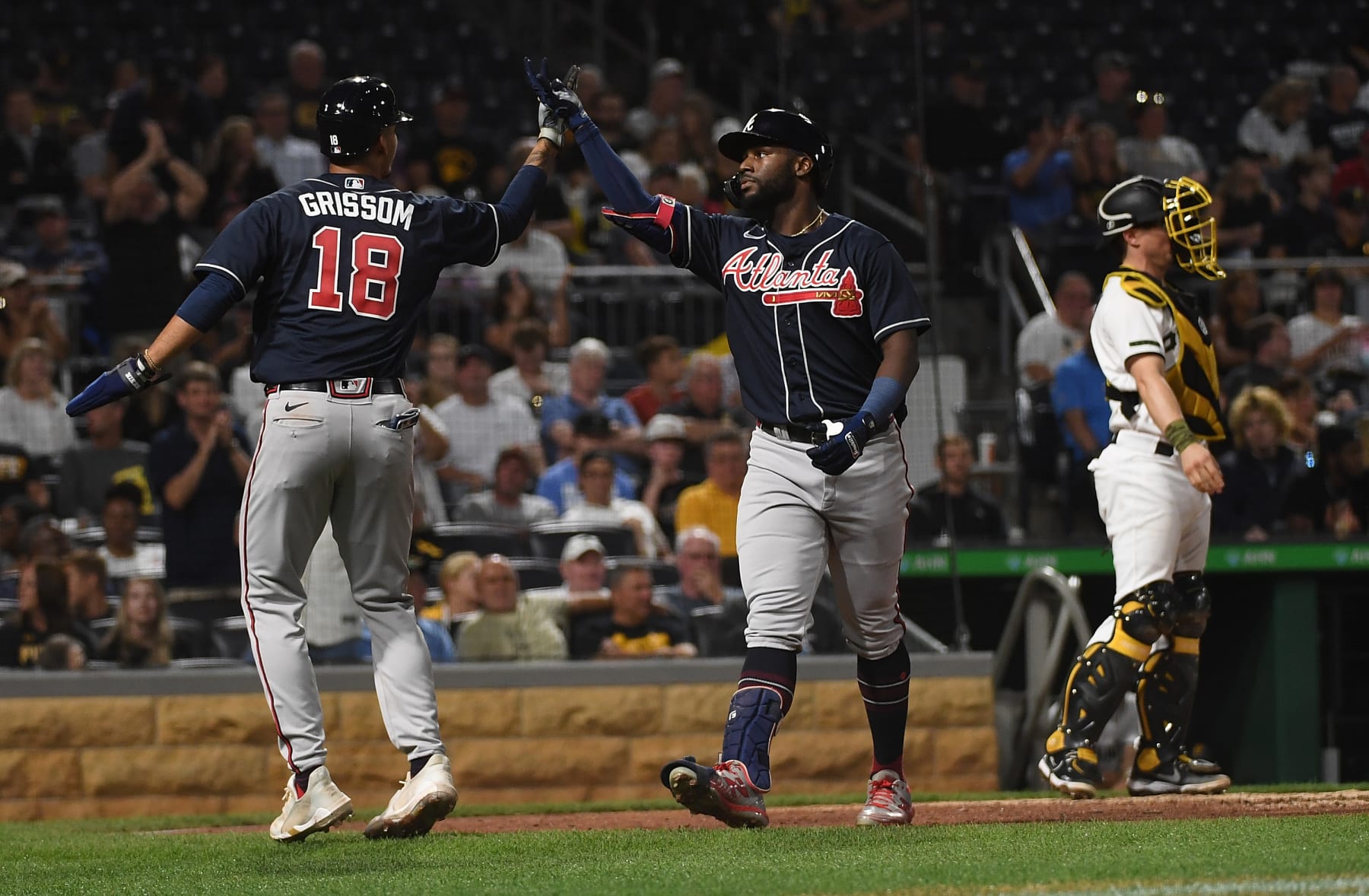 PITTSBURGH, PA - AUGUST 22: Michael Harris II #23 of the Atlanta Braves celebrates with Vaughn Grissom #18 after hitting a two run home run in the fifth inning during the game against the Pittsburgh Pirates at PNC Park on August 22, 2022 in Pittsburgh, Pennsylvania. (Photo by Justin Berl/Getty Images)