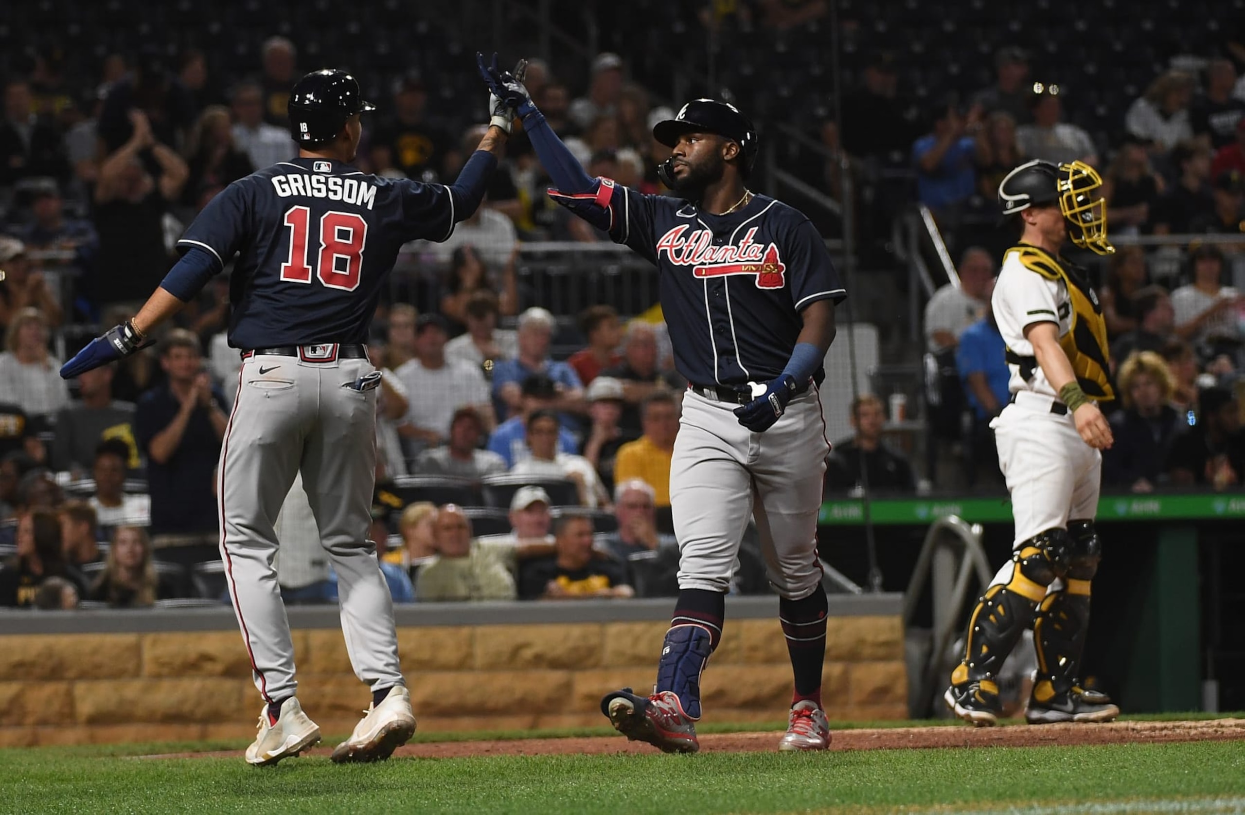 PITTSBURGH, PA - AUGUST 22: Michael Harris II #23 of the Atlanta Braves celebrates with Vaughn Grissom #18 after hitting a two run home run in the fifth inning during the game against the Pittsburgh Pirates at PNC Park on August 22, 2022 in Pittsburgh, Pennsylvania. (Photo by Justin Berl/Getty Images)