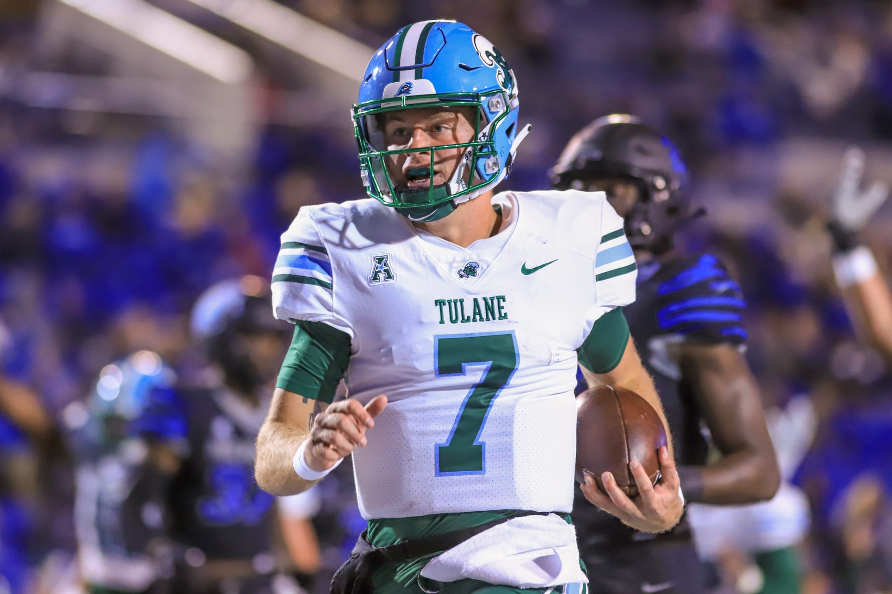 MEMPHIS, TN - NOVEMBER 27: Tulane Green Wave quarterback Michael Pratt (7) goes in for a touchdown during the game between the Memphis Tigers and the Tulane Green Wave on November 27, 2021, at The Liberty Bowl Memorial Stadium in Memphis, TN (Photo by Chris McDill/Icon Sportswire via Getty Images)