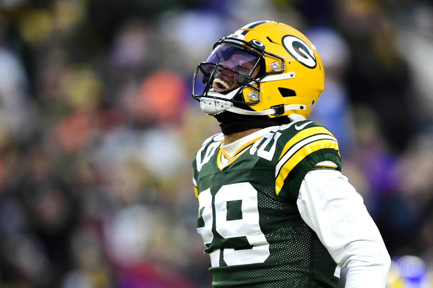 GREEN BAY, WISCONSIN - NOVEMBER 28: Rasul Douglas #29 of the Green Bay Packers reacts after the Los Angeles Rams turned the ball over after a play on fourth down during the first half at Lambeau Field on November 28, 2021 in Green Bay, Wisconsin. (Photo by Patrick McDermott/Getty Images)