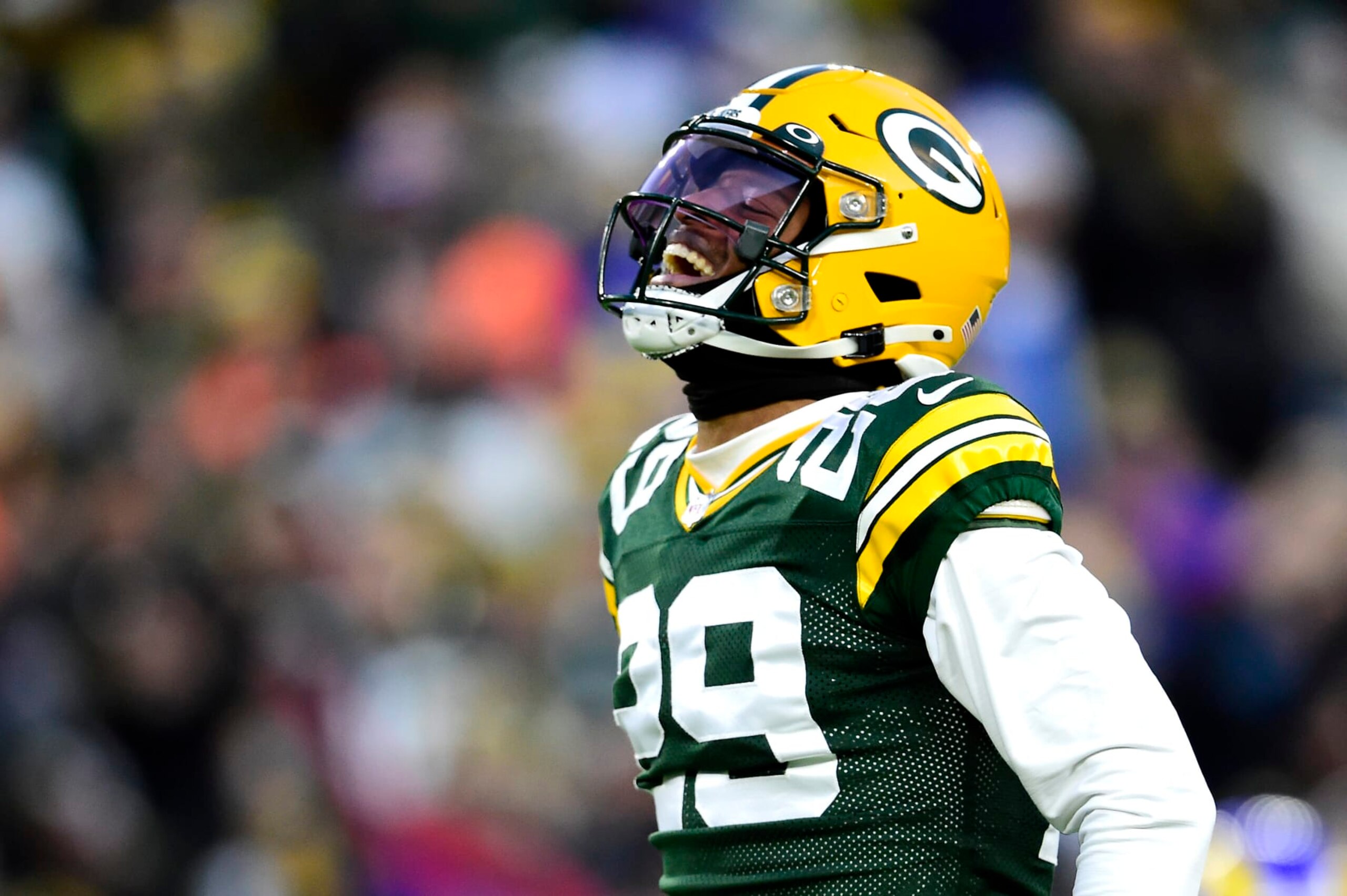 GREEN BAY, WISCONSIN - NOVEMBER 28: Rasul Douglas #29 of the Green Bay Packers reacts after the Los Angeles Rams turned the ball over after a play on fourth down during the first half at Lambeau Field on November 28, 2021 in Green Bay, Wisconsin. (Photo by Patrick McDermott/Getty Images)