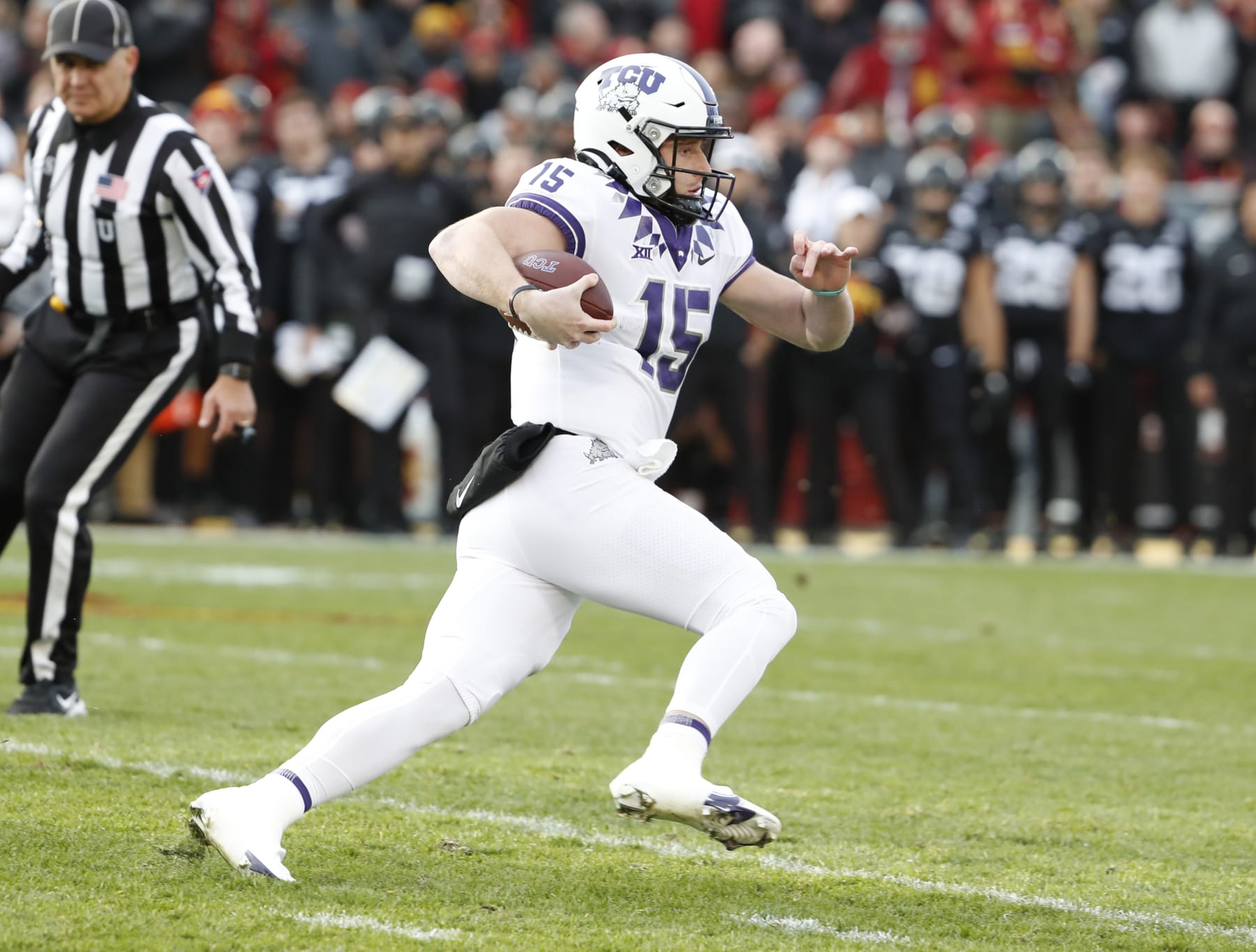 AMES, IA - NOVEMBER 26: Quarterback Max Duggan #15 of the TCU Horned Frogs scrambles for yards in the first half of play at Jack Trice Stadium on November 26, 2021 in Ames, Iowa. The Iowa State Cyclones won 48-14 over the TCU Horned Frogs. (Photo by David K Purdy/Getty Images)