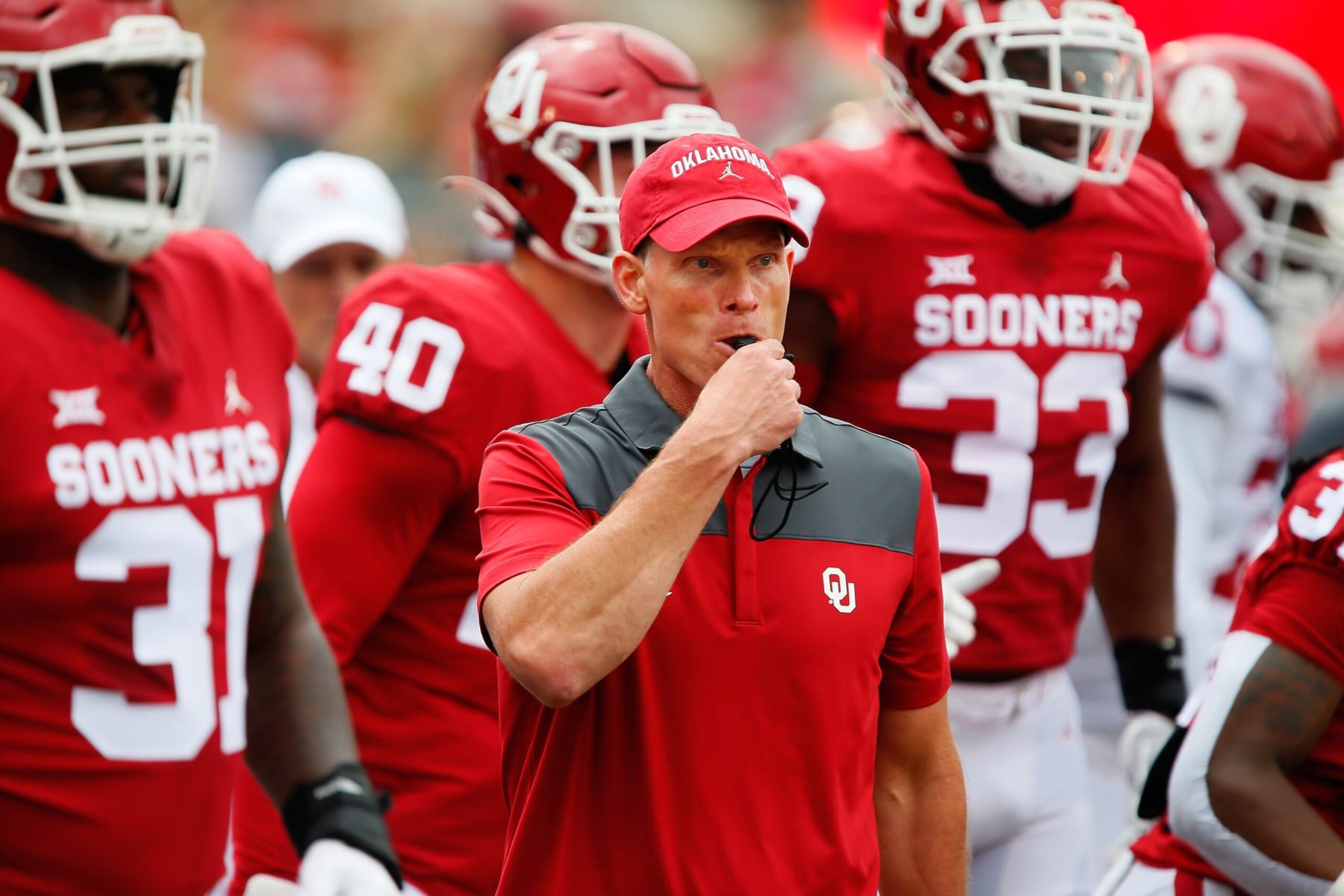 NORMAN, OK - APRIL 23: Head coach Brent Venables of the Oklahoma Sooners runs his team's pre-game plays during their spring game at Gaylord Family Oklahoma Memorial Stadium on April 23, 2022 in Norman, Oklahoma. (Photo by Brian Bahr/Getty Images) NORMAN, OK - APRIL 23: Head coach Brent Venables of the Oklahoma Sooners runs his team's pre-game plays during their spring game at Gaylord Family Oklahoma Memorial Stadium on April 23, 2022 in Norman, Oklahoma. (Photo by Brian Bahr/Getty Images)