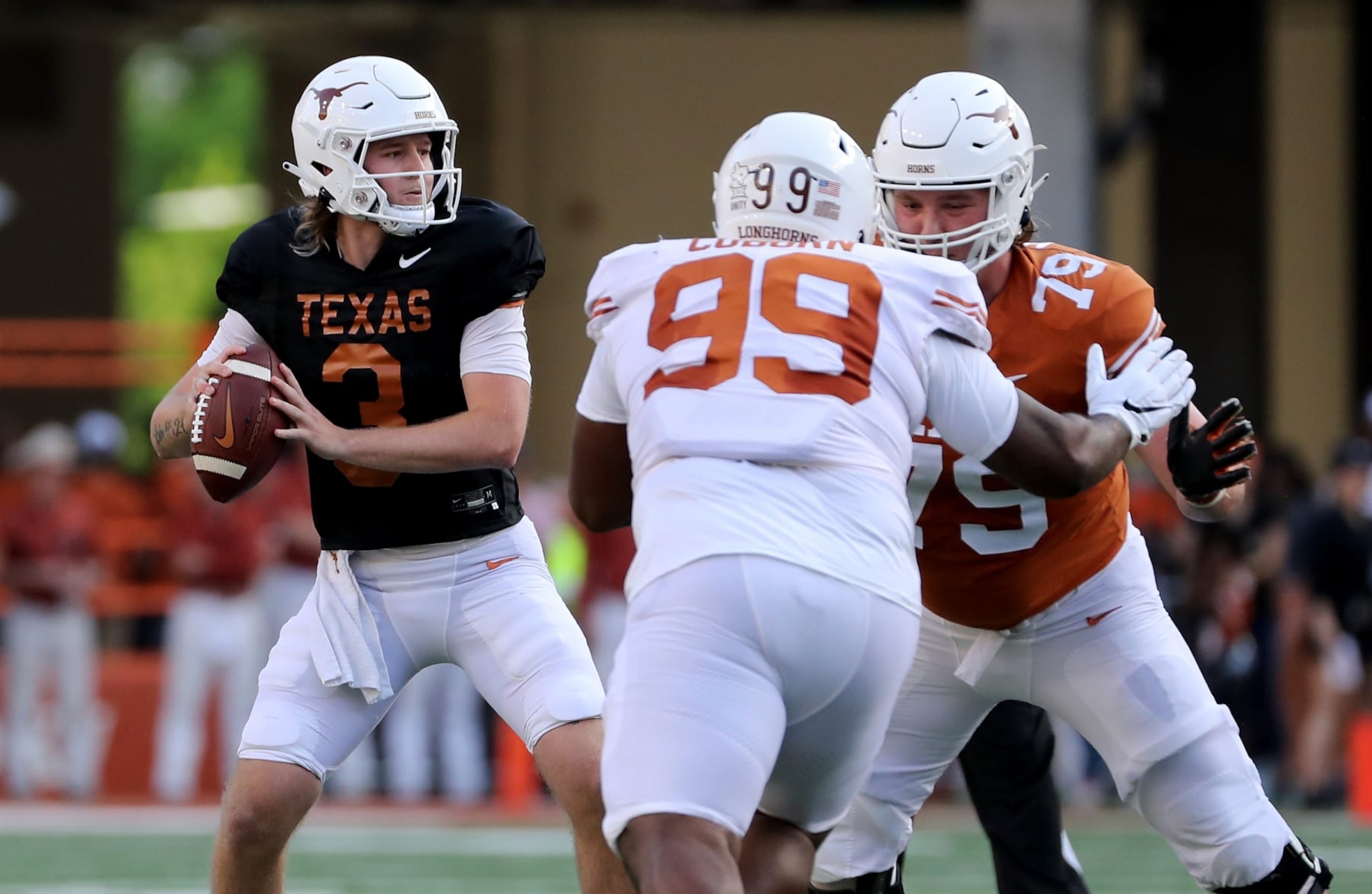 AUSTIN, TEXAS - APRIL 23: Quinn Ewers #3 of Texas Longhorns looks to pass during the Orange-White Spring Game at Darrell K Royal-Texas Memorial Stadium on April 23, 2022 in Austin, Texas. (Photo by Tim Warner/Getty Images) AUSTIN, TEXAS - APRIL 23: Quinn Ewers #3 of Texas Longhorns looks to pass during the Orange-White Spring Game at Darrell K Royal-Texas Memorial Stadium on April 23, 2022 in Austin, Texas. (Photo by Tim Warner/Getty Images)