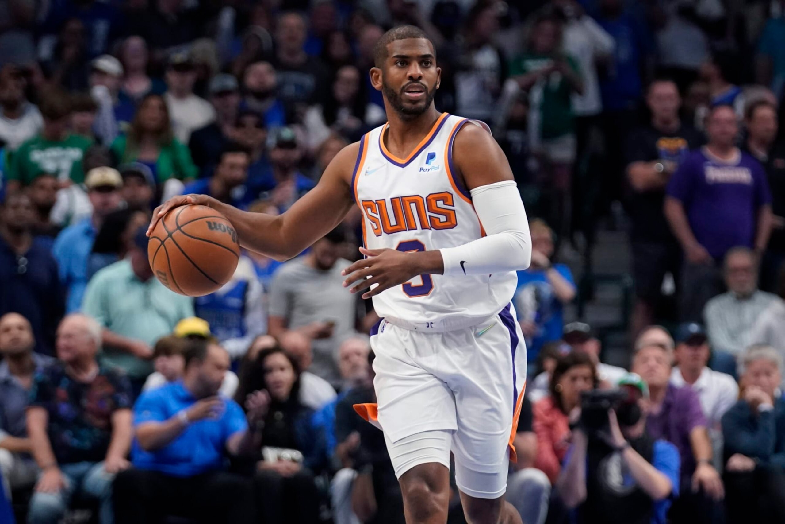 Phoenix Suns guard Chris Paul (3) advances the ball against the Dallas Mavericks during the first half of Game 6 of an NBA basketball second-round playoff series, Thursday, May 12, 2022, in Dallas. (AP Photo/Tony Gutierrez) Phoenix Suns guard Chris Paul (3) advances the ball against the Dallas Mavericks during the first half of Game 6 of an NBA basketball second-round playoff series, Thursday, May 12, 2022, in Dallas. (AP Photo/Tony Gutierrez)