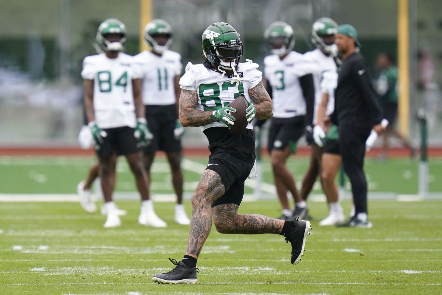 New York Jets' Tyler Conklin participates in a drill at the NFL football team's training facility in Florham Park, N.J., Tuesday, May 24, 2022. (AP Photo/Seth Wenig)