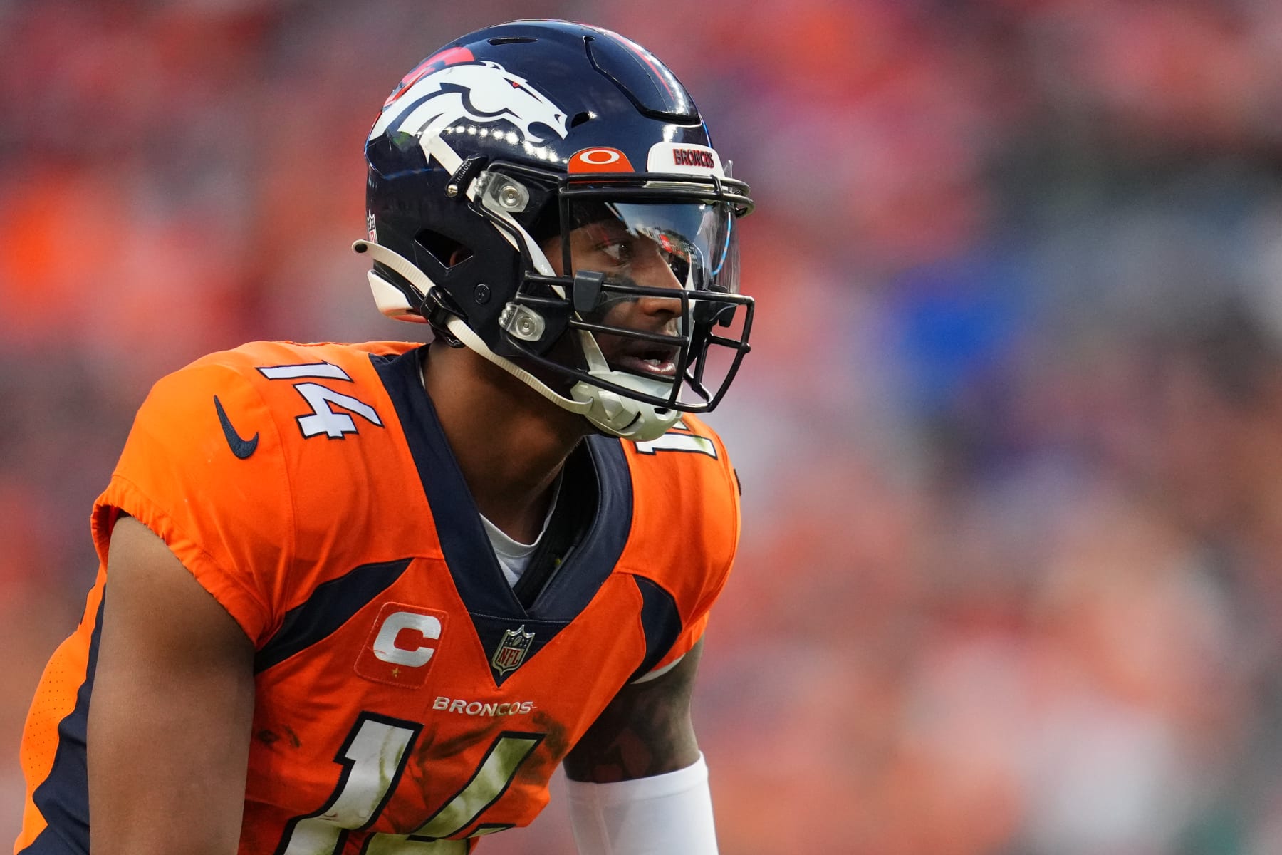 DENVER, COLORADO - DECEMBER 19: Courtland Sutton #14 of the Denver Broncos gets set against the Cincinnati Bengals during an NFL game at Empower Field At Mile High on December 19, 2021 in Denver, Colorado. (Photo by Cooper Neill/Getty Images)