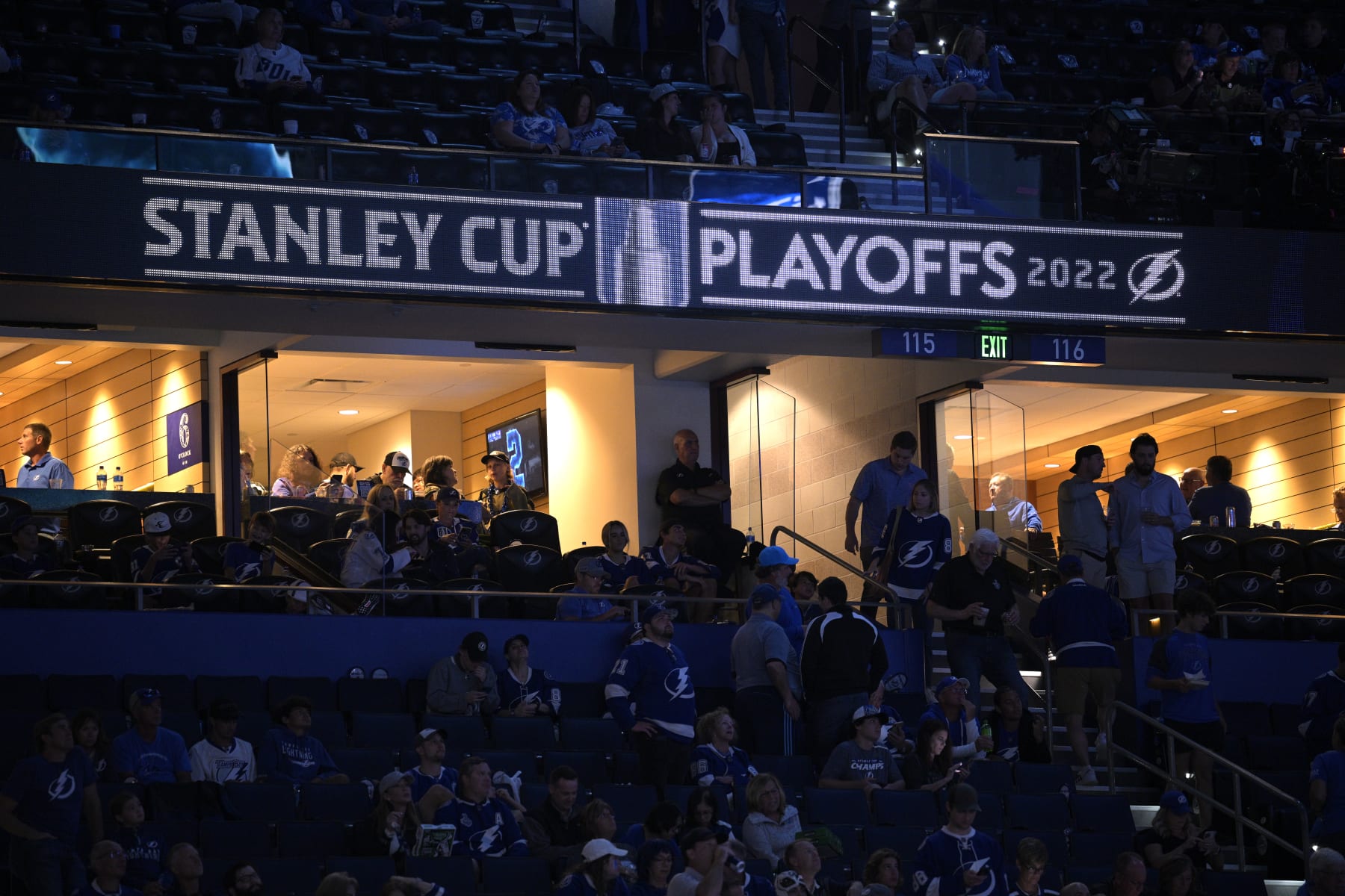 The Stanley Cup Playoffs message is displayed on a screen in the stands before the second period of Game 3 of the NHL hockey Stanley Cup Finals between the Tampa Bay Lightning and the Colorado Avalanche on Monday, June 20, 2022, in Tampa, Fla. (AP Photo/Phelan M. Ebenhack)