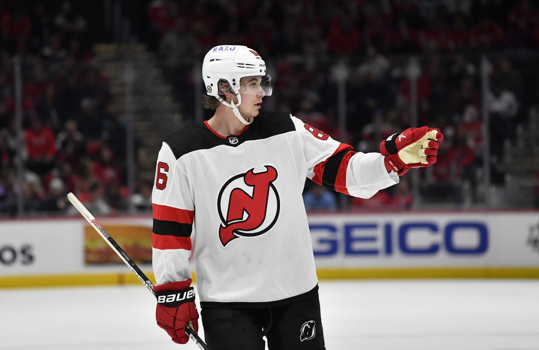WASHINGTON, DC - MARCH 26: Devils center Jack Hughes (86) waits for a face-off during the New Jersey Devils versus Washington Capitals National Hockey League game on March 26, 2022 at Capital One Arena in Washington, D.C.. (Photo by Randy Litzinger/Icon Sportswire via Getty Images)