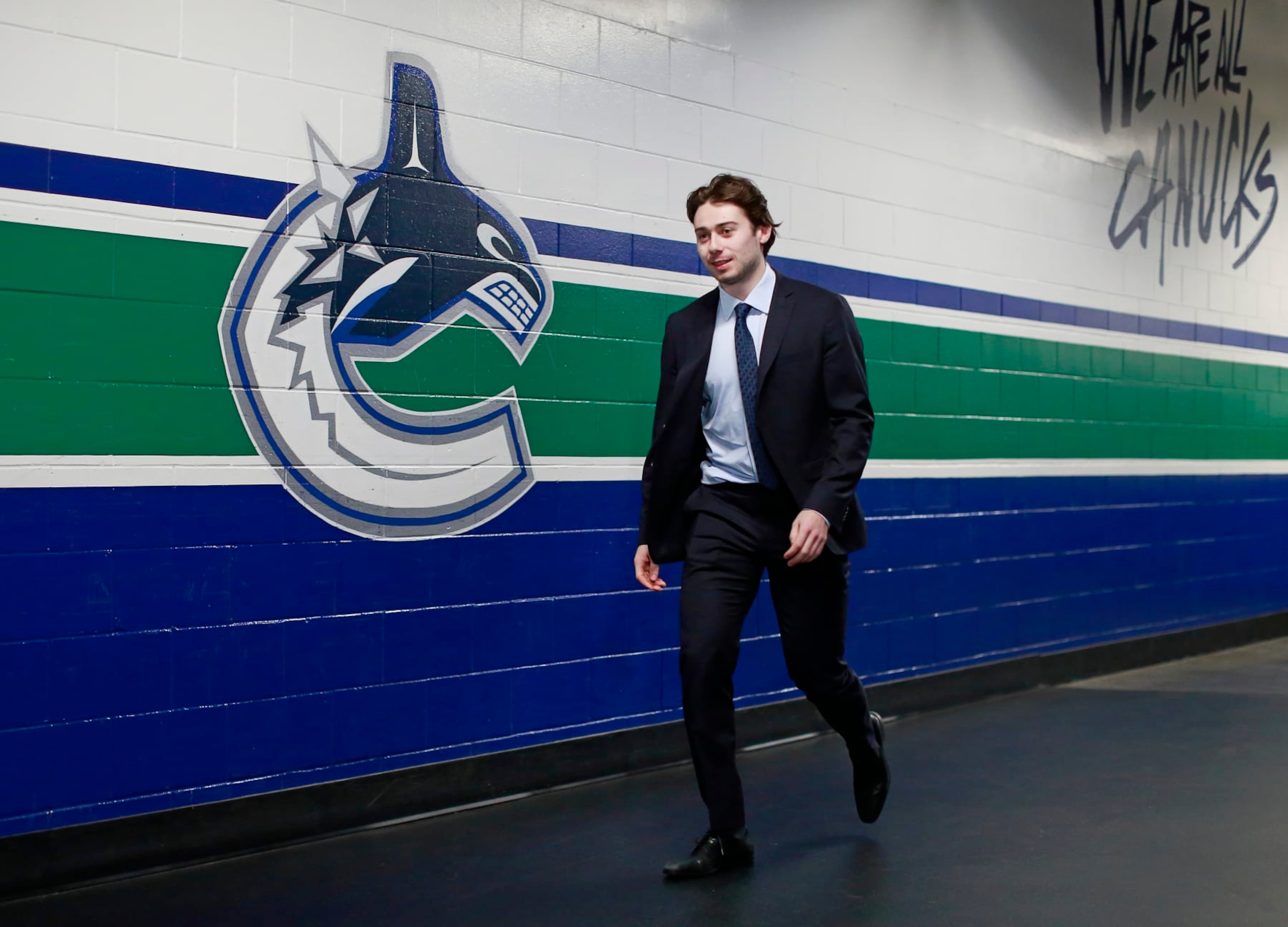 VANCOUVER, BC - APRIL 14: Quinn Hughes #43 of the Vancouver Canucks walks to the Canucks dressing room before their NHL game against the Arizona Coyotes at Rogers Arena April 14, 2022 in Vancouver, British Columbia, Canada. (Photo by Jeff Vinnick/NHLI via Getty Images) VANCOUVER, BC - APRIL 14: Quinn Hughes #43 of the Vancouver Canucks walks to the Canucks dressing room before their NHL game against the Arizona Coyotes at Rogers Arena April 14, 2022 in Vancouver, British Columbia, Canada. (Photo by Jeff Vinnick/NHLI via Getty Images)