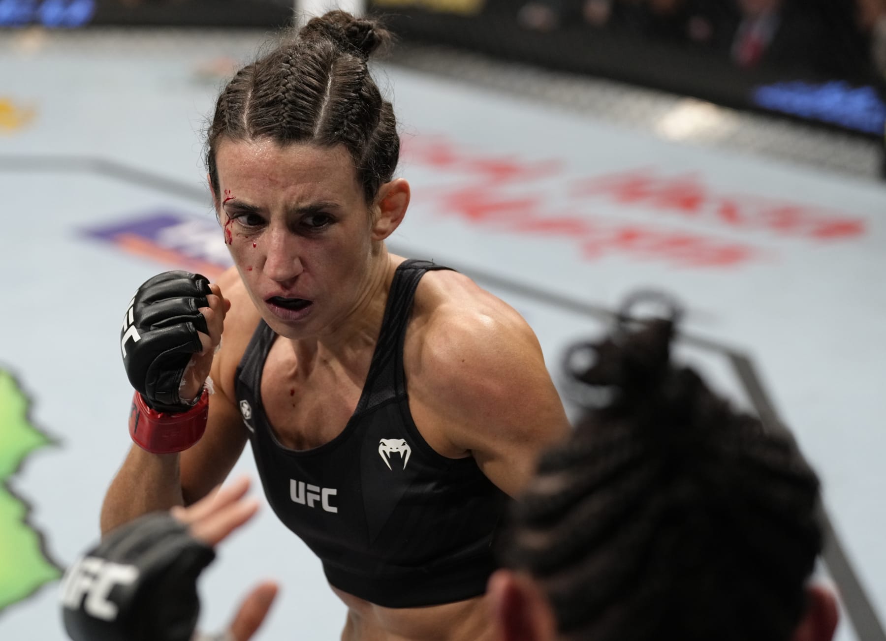 LAS VEGAS, NEVADA - MARCH 05: (L-R) Marina Rodriguez of Brazil battles Yan Xiaonan of China in their lightweight fight during the UFC 272 event on March 05, 2022 in Las Vegas, Nevada. (Photo by Jeff Bottari/Zuffa LLC) LAS VEGAS, NEVADA - MARCH 05: (L-R) Marina Rodriguez of Brazil battles Yan Xiaonan of China in their lightweight fight during the UFC 272 event on March 05, 2022 in Las Vegas, Nevada. (Photo by Jeff Bottari/Zuffa LLC)