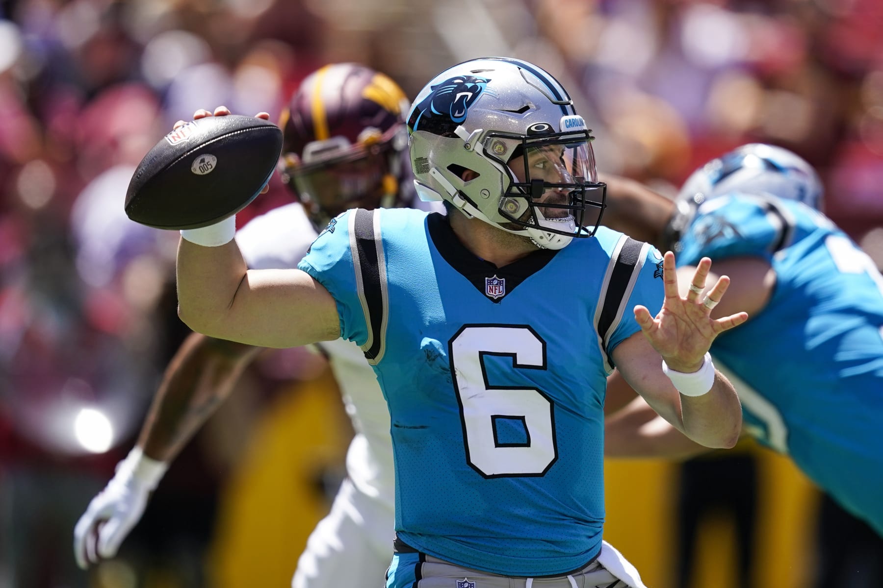 Carolina Panthers quarterback Baker Mayfield throws a pass during the first half of a NFL preseason football game against the Washington Commanders, Saturday, Aug. 13, 2022, in Landover, Md. (AP Photo/Alex Brandon) Carolina Panthers quarterback Baker Mayfield throws a pass during the first half of a NFL preseason football game against the Washington Commanders, Saturday, Aug. 13, 2022, in Landover, Md. (AP Photo/Alex Brandon)
