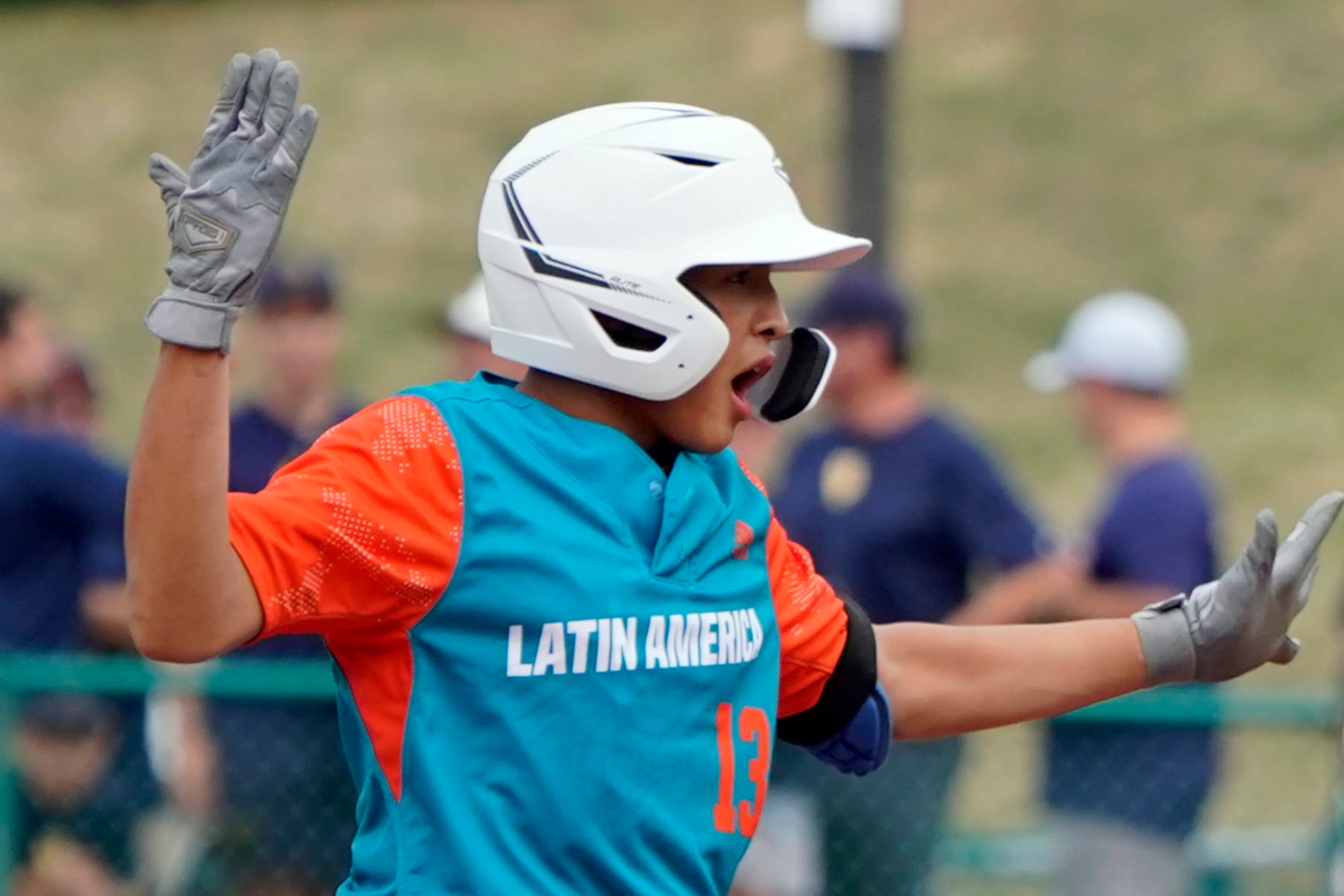 Nicaragua's Luis Garcia (13) celebrates after his double against Curacao during the fourth inning of a baseball game at the Little League World Series tournament in South Williamsport, Pa., Wednesday, Aug. 17, 2022. Curacao won the game 2-0. (AP Photo/Tom E. Puskar) Nicaragua's Luis Garcia (13) celebrates after his double against Curacao during the fourth inning of a baseball game at the Little League World Series tournament in South Williamsport, Pa., Wednesday, Aug. 17, 2022. Curacao won the game 2-0. (AP Photo/Tom E. Puskar)