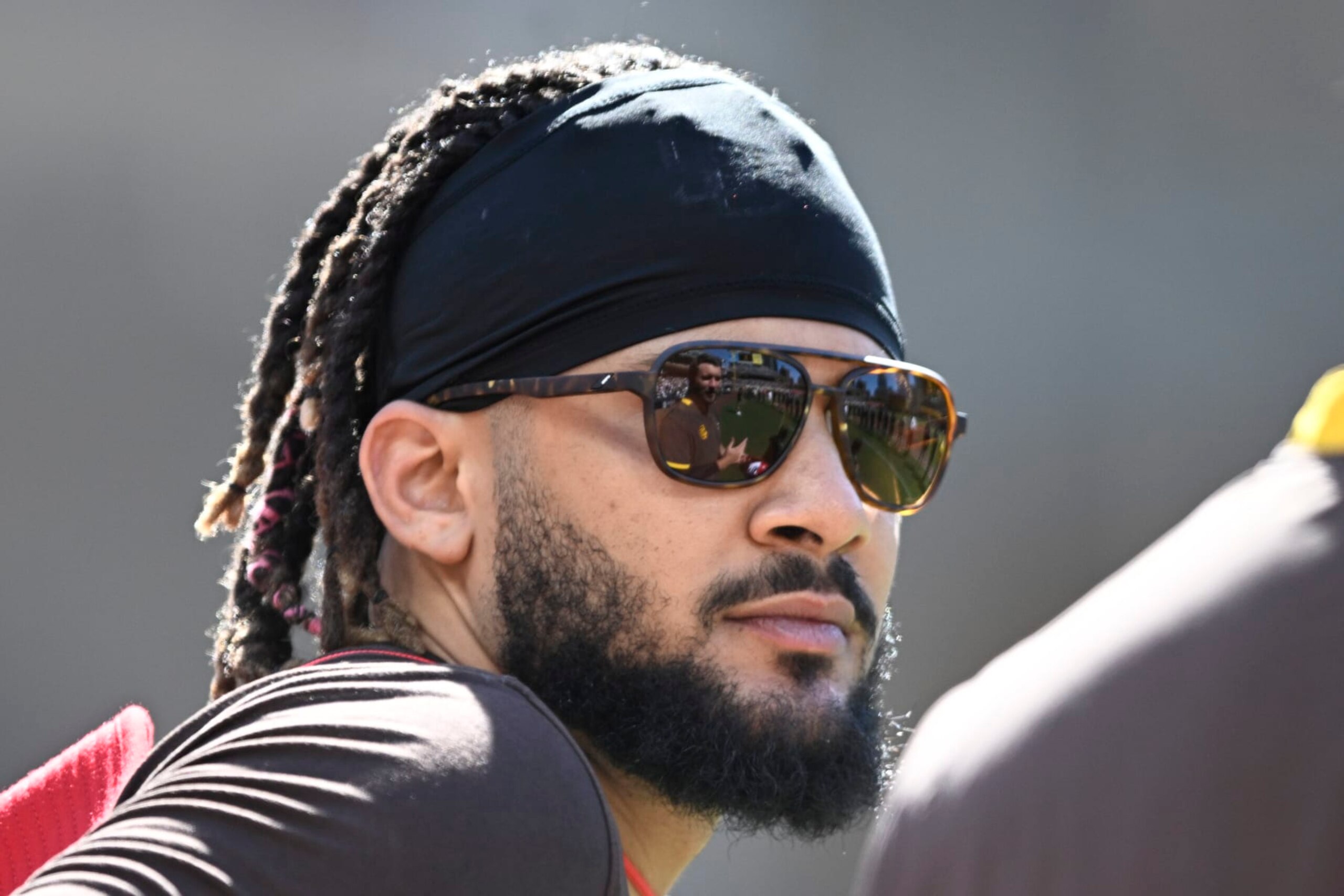 SAN DIEGO, CA - JULY 4:  Fernando Tatis Jr. #23 of the San Diego Padres looks on before a baseball game against the Seattle Mariners July 4, 2022 at Petco Park in San Diego, California. (Photo by Denis Poroy/Getty Images)