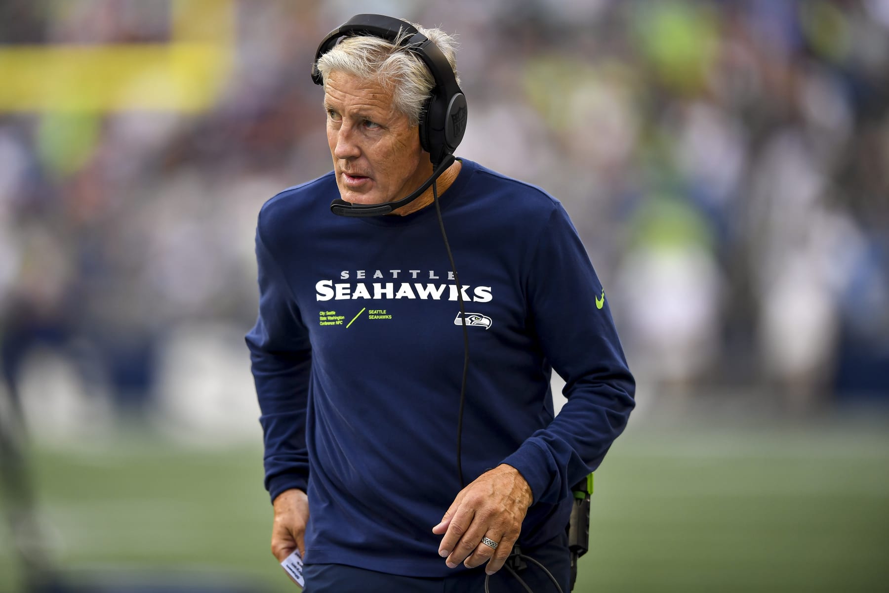 SEATTLE, WASHINGTON - AUGUST 18: Head coach Pete Carroll of the Seattle Seahawks walks the sideline in the third quarter during the preseason game against the Chicago Bears at Lumen Field on August 18, 2022 in Seattle, Washington. (Photo by Jane Gershovich/Getty Images)