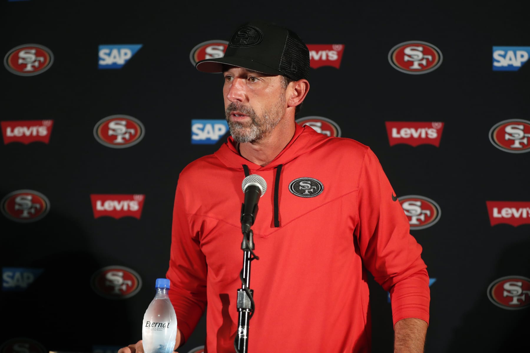San Francisco 49ers head coach Kyle Shanahan speaks during a news conference after a preseason NFL football game against the Minnesota Vikings, Saturday, Aug. 20, 2022, in Minneapolis. (AP Photo/Bruce Kluckhohn)