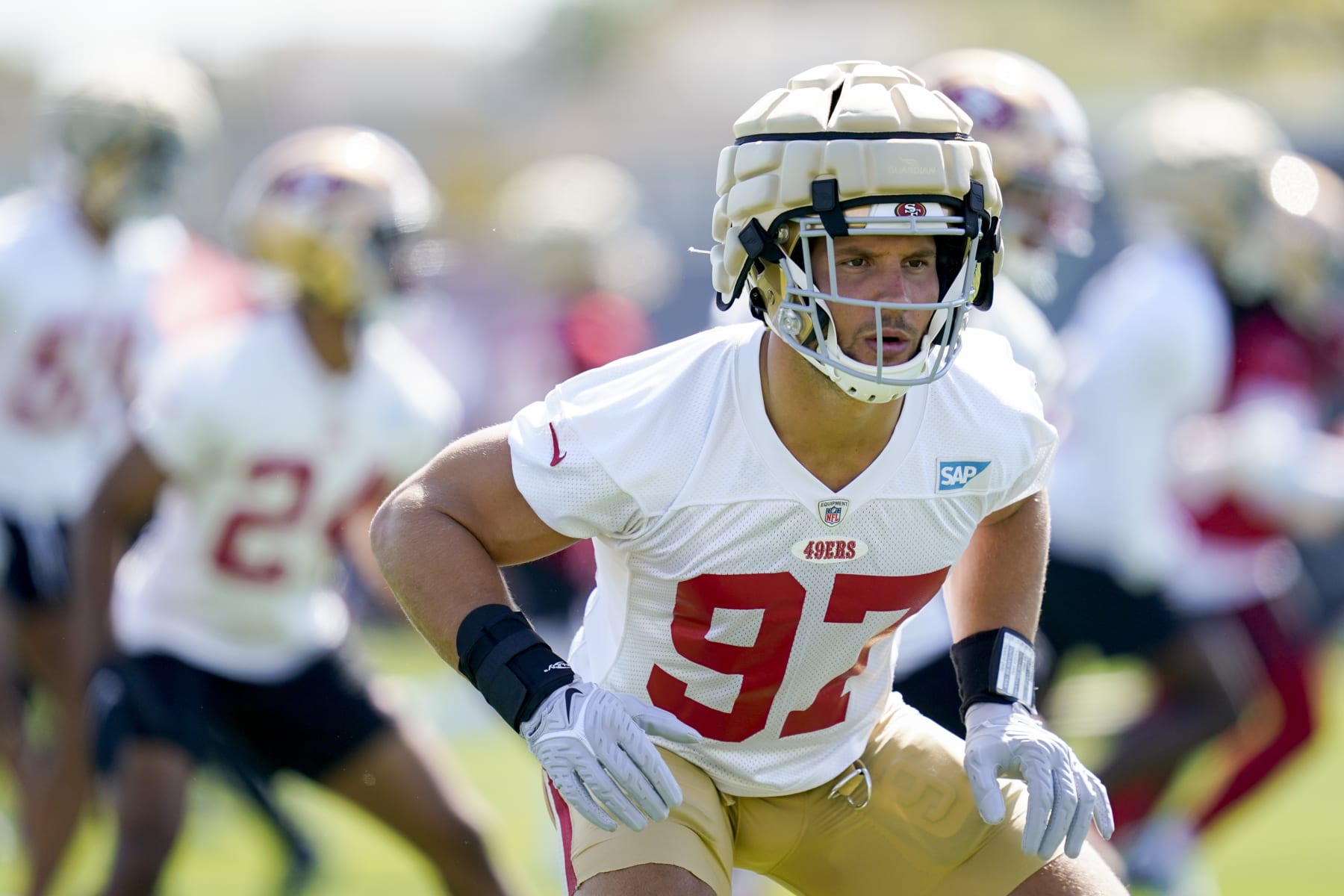 San Francisco 49ers defensive lineman Nick Bosa warms up during NFL football training camp in Santa Clara, Calif., Wednesday, July 27, 2022. (AP Photo/Godofredo A. Vásquez)