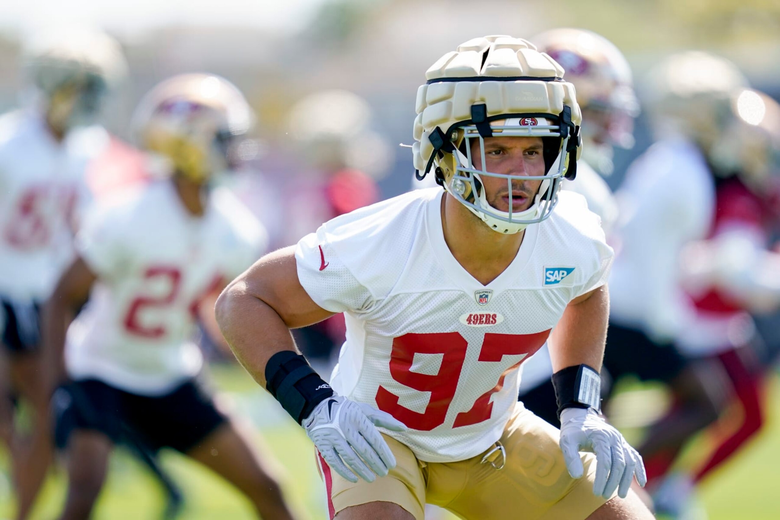 San Francisco 49ers defensive lineman Nick Bosa warms up during NFL football training camp in Santa Clara, Calif., Wednesday, July 27, 2022. (AP Photo/Godofredo A. Vásquez)