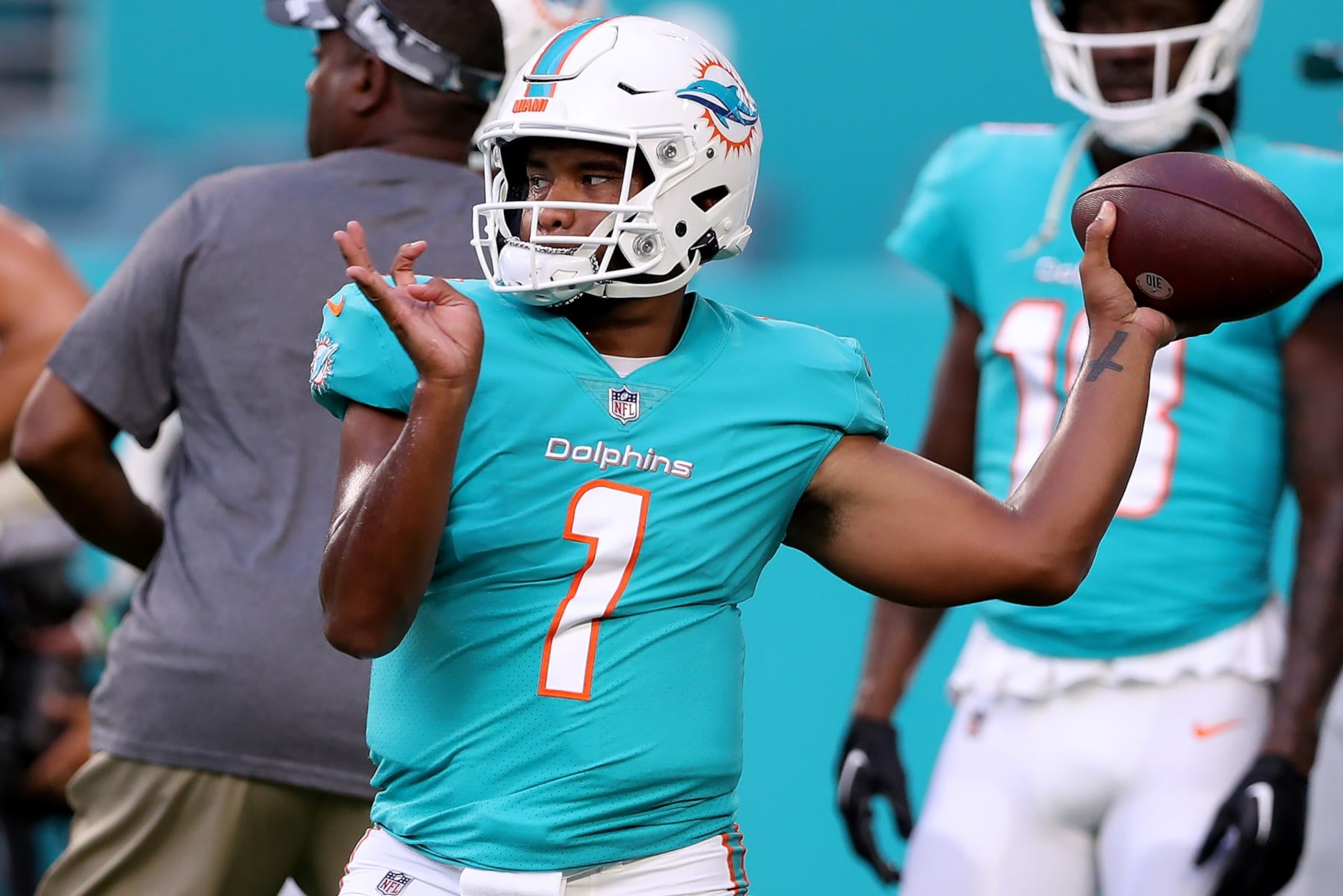 MIAMI GARDENS, FLORIDA - AUGUST 20: Tua Tagovailoa #1 of the Miami Dolphins warms up prior to playing the Las Vegas Raiders at Hard Rock Stadium on August 20, 2022 in Miami Gardens, Florida. (Photo by Megan Briggs/Getty Images) MIAMI GARDENS, FLORIDA - AUGUST 20: Tua Tagovailoa #1 of the Miami Dolphins warms up prior to playing the Las Vegas Raiders at Hard Rock Stadium on August 20, 2022 in Miami Gardens, Florida. (Photo by Megan Briggs/Getty Images)