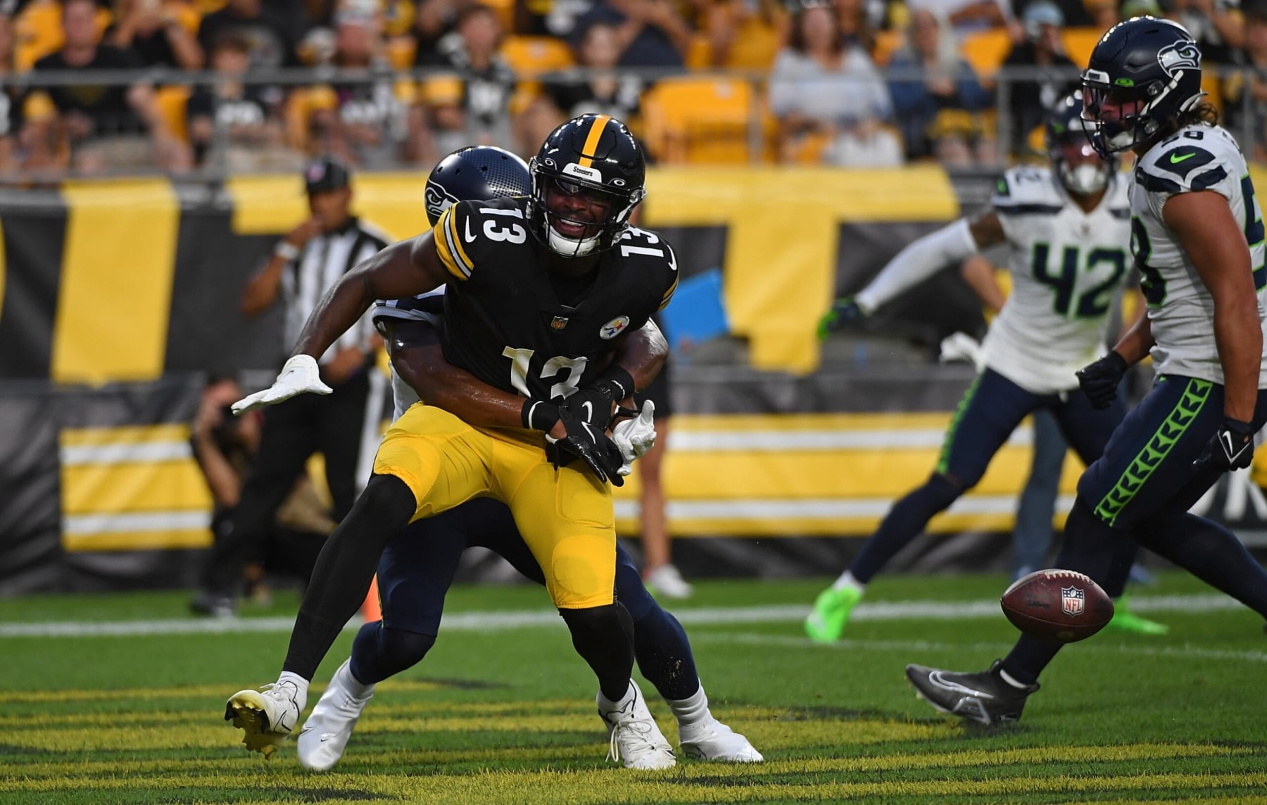 PITTSBURGH, PA - AUGUST 13: Miles Boykin #13 of the Pittsburgh Steelers cannot come up with a reception in the second quarter during a preseason game against the Seattle Seahawks at Acrisure Stadium on August 13, 2022 in Pittsburgh, Pennsylvania. (Photo by Justin Berl/Getty Images) PITTSBURGH, PA - AUGUST 13: Miles Boykin #13 of the Pittsburgh Steelers cannot come up with a reception in the second quarter during a preseason game against the Seattle Seahawks at Acrisure Stadium on August 13, 2022 in Pittsburgh, Pennsylvania. (Photo by Justin Berl/Getty Images)