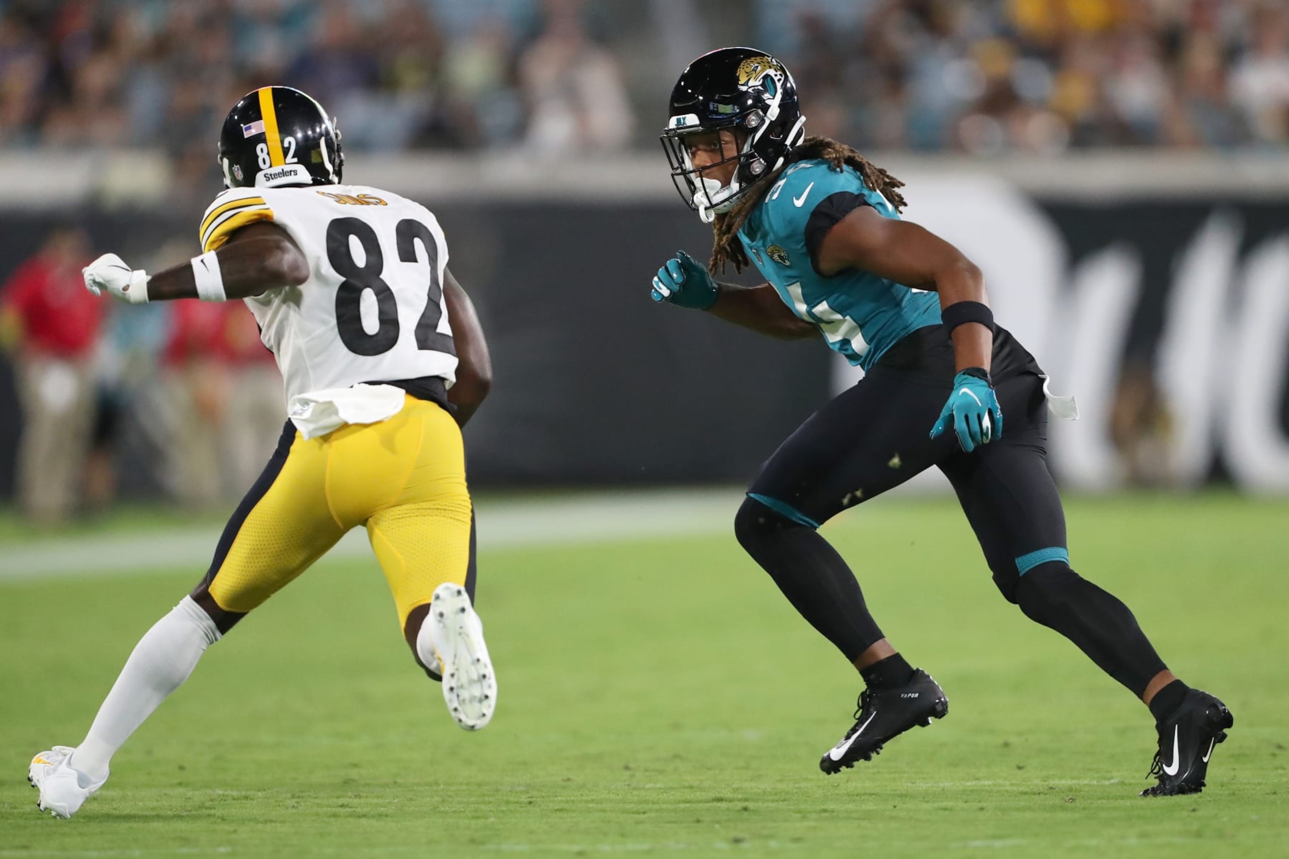JACKSONVILLE, FLORIDA - AUGUST 20: Gregory Junior #34 of the Jacksonville Jaguars guards Steven Sims #82 of the Pittsburgh Steelers during the second half of a preseason game at TIAA Bank Field on August 20, 2022 in Jacksonville, Florida. (Photo by Courtney Culbreath/Getty Images) JACKSONVILLE, FLORIDA - AUGUST 20: Gregory Junior #34 of the Jacksonville Jaguars guards Steven Sims #82 of the Pittsburgh Steelers during the second half of a preseason game at TIAA Bank Field on August 20, 2022 in Jacksonville, Florida. (Photo by Courtney Culbreath/Getty Images)