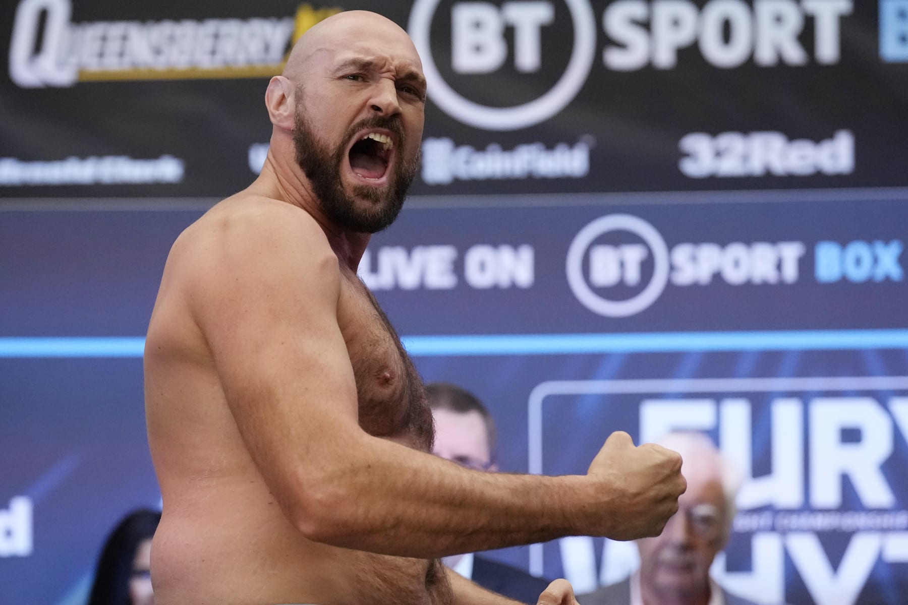 British heavyweight boxers Tyson Fury and Dillian Whyte go head-to-head as they take part in their weigh-in at the Boxpark Wembley venue, near Wembley Stadium, in London, Friday, April 22, 2022. Wembley Stadium will stage Tyson Fury's defense of the WBC heavyweight title against British countryman Dillian Whyte on Saturday. (AP Photo/Matt Dunham)