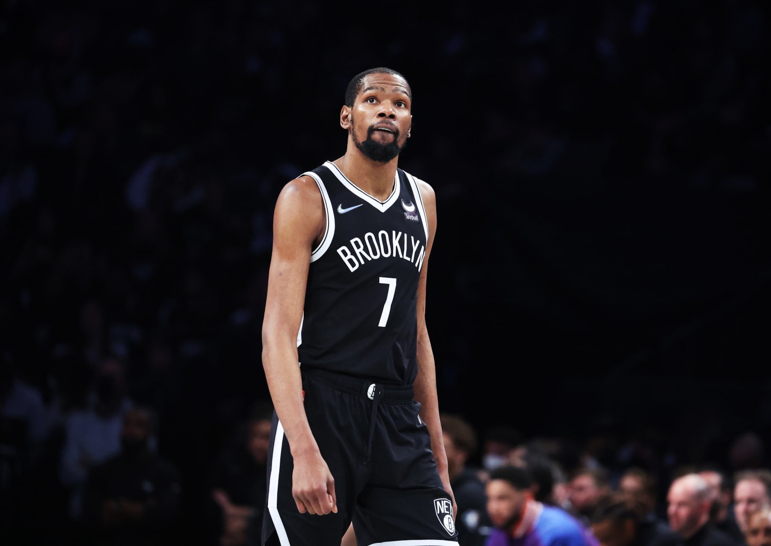 NEW YORK, NEW YORK - APRIL 23: Kevin Durant #7 of the Brooklyn Nets looks on against the Boston Celtics during Game Three of the Eastern Conference First Round NBA Playoffs at Barclays Center on April 23, 2022 in New York City. NOTE TO USER: User expressly acknowledges and agrees that, by downloading and or using this photograph, User is consenting to the terms and conditions of the Getty Images License Agreement. (Photo by Al Bello/Getty Images). NEW YORK, NEW YORK - APRIL 23: Kevin Durant #7 of the Brooklyn Nets looks on against the Boston Celtics during Game Three of the Eastern Conference First Round NBA Playoffs at Barclays Center on April 23, 2022 in New York City. NOTE TO USER: User expressly acknowledges and agrees that, by downloading and or using this photograph, User is consenting to the terms and conditions of the Getty Images License Agreement. (Photo by Al Bello/Getty Images).