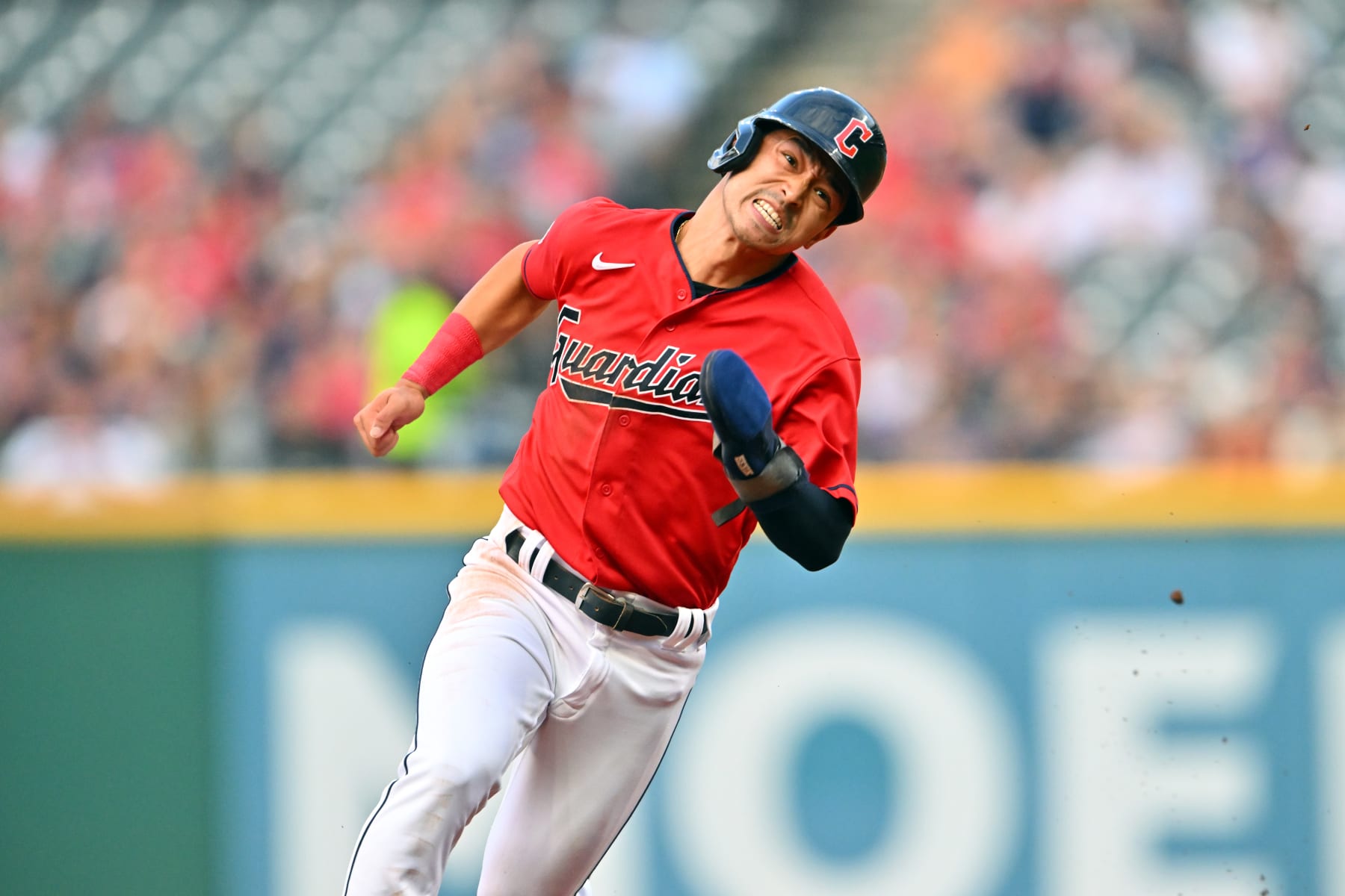 CLEVELAND, OHIO - AUGUST 16: Steven Kwan #38 of the Cleveland Guardians rounds second base on a single off the bat of Amed Rosario in the first inning against the Detroit Tigers at Progressive Field on August 16, 2022 in Cleveland, Ohio. (Photo by Jason Miller/Getty Images)