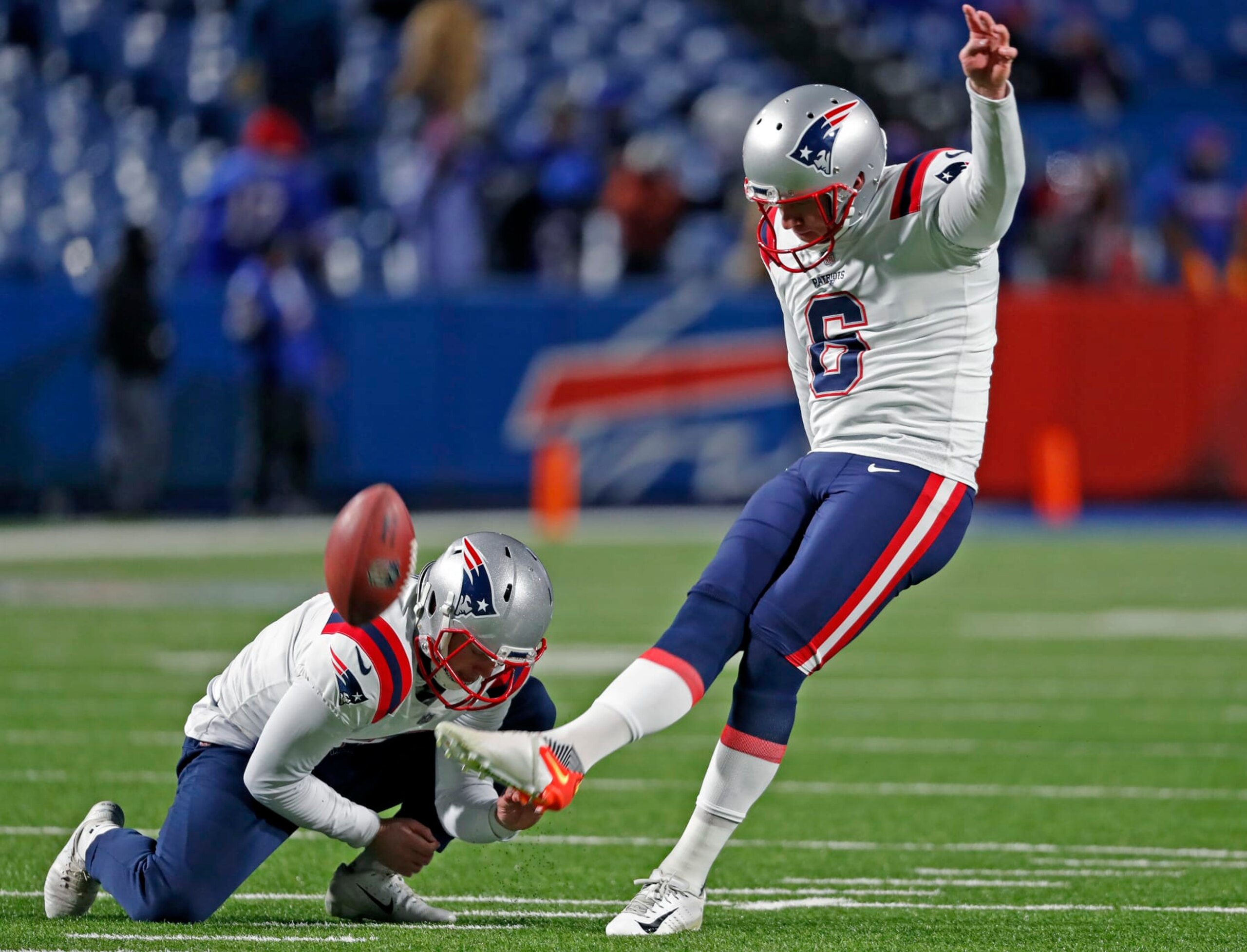 Orchard Park, NY - January 15: Out of the hold of Jake Bailey, Patriots kicker Nick Folk practices field goals before the game. The Buffalo Bills host the New England Patriots in a AFC wild-card game Saturday night January 15, 2022 at Highmark Stadium in Orchard Park, NY.  (Photo by Jim Davis/The Boston Globe via Getty Images)