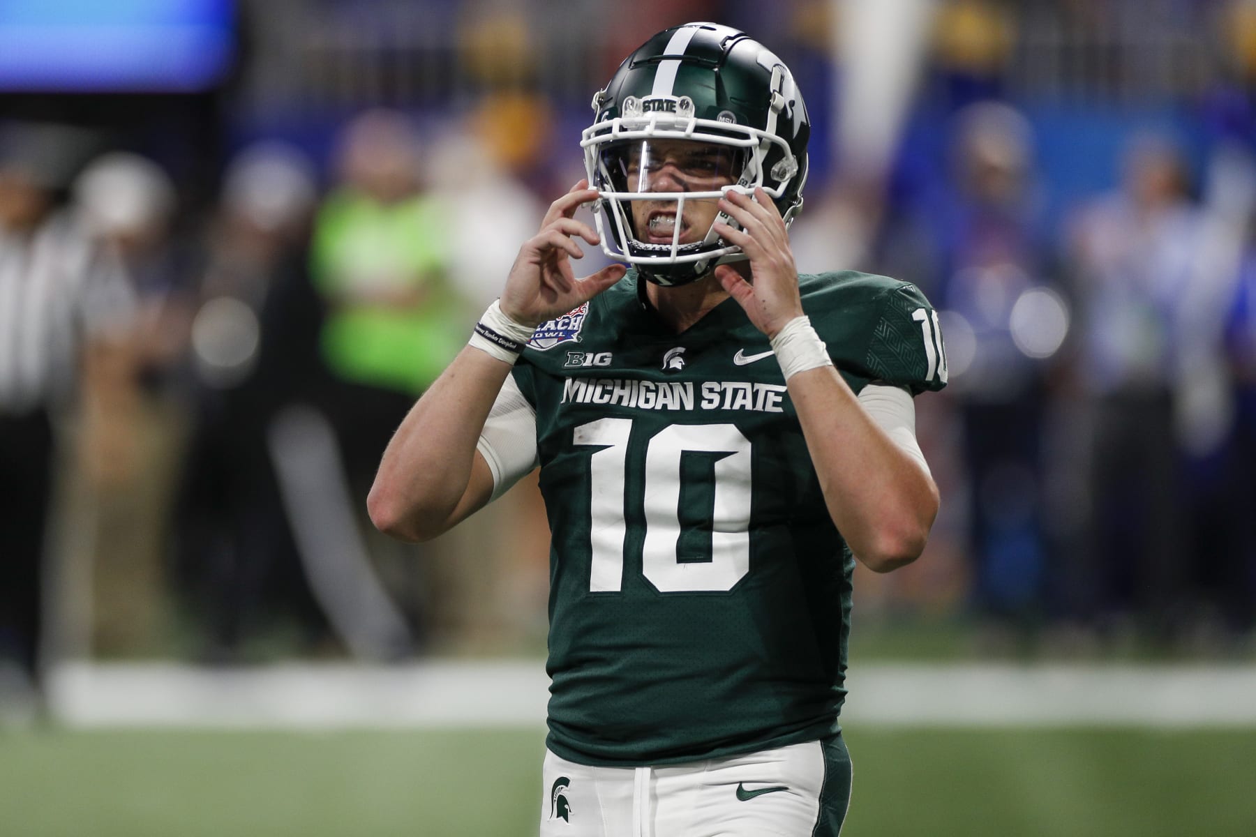 ATLANTA, GA - DECEMBER 30: Michigan State Spartans quarterback Payton Thorne reacts during the 2021 Chick-fil-A Peach Bowl between the Michigan State Spartans and the Pittsburgh Panthers on December 30, 2021 at Mercedes-Benz Stadium in Atlanta, GA. (Photo by Brandon Sloter/Icon Sportswire via Getty Images)