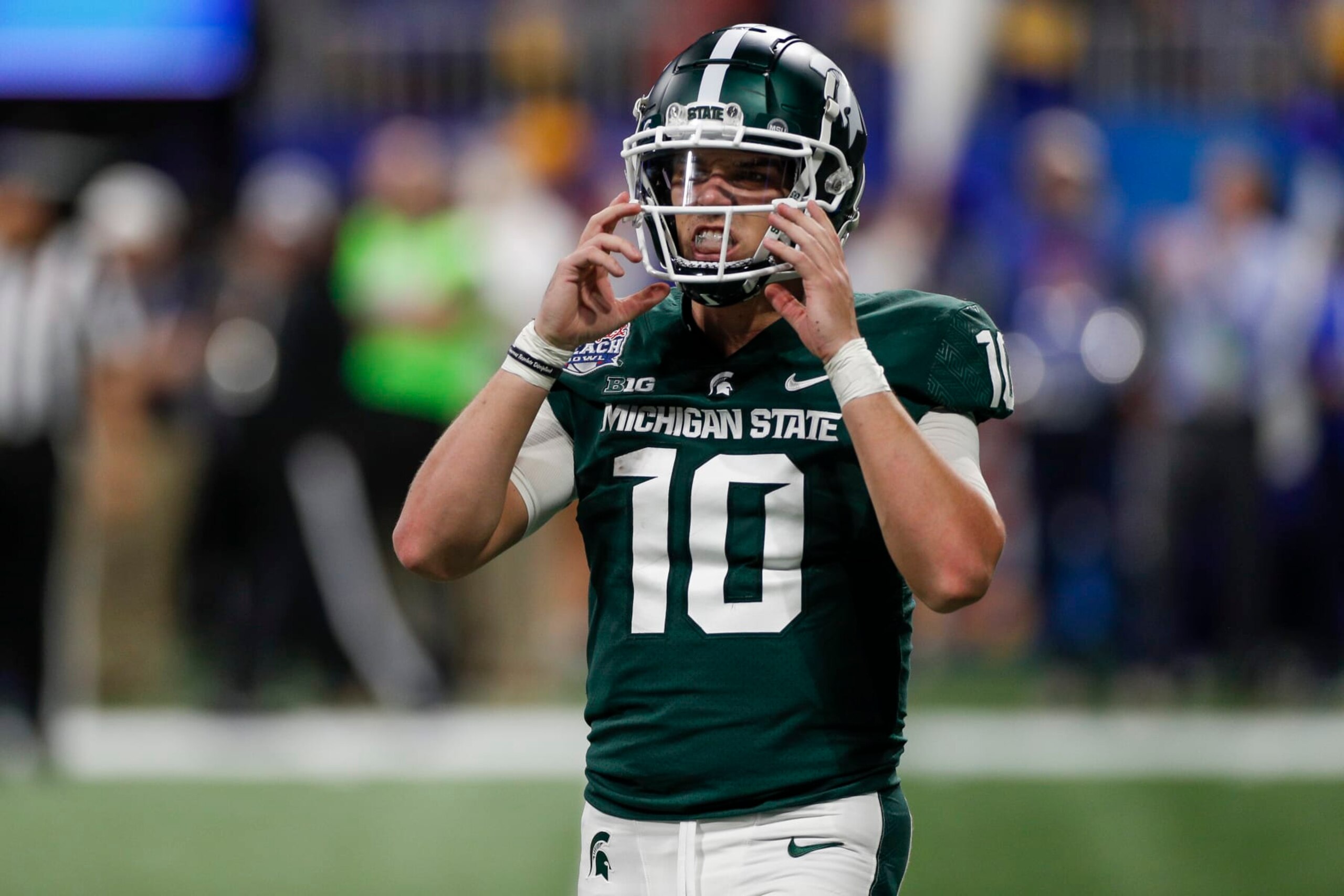 ATLANTA, GA - DECEMBER 30: Michigan State Spartans quarterback Payton Thorne reacts during the 2021 Chick-fil-A Peach Bowl between the Michigan State Spartans and the Pittsburgh Panthers on December 30, 2021 at Mercedes-Benz Stadium in Atlanta, GA. (Photo by Brandon Sloter/Icon Sportswire via Getty Images)
