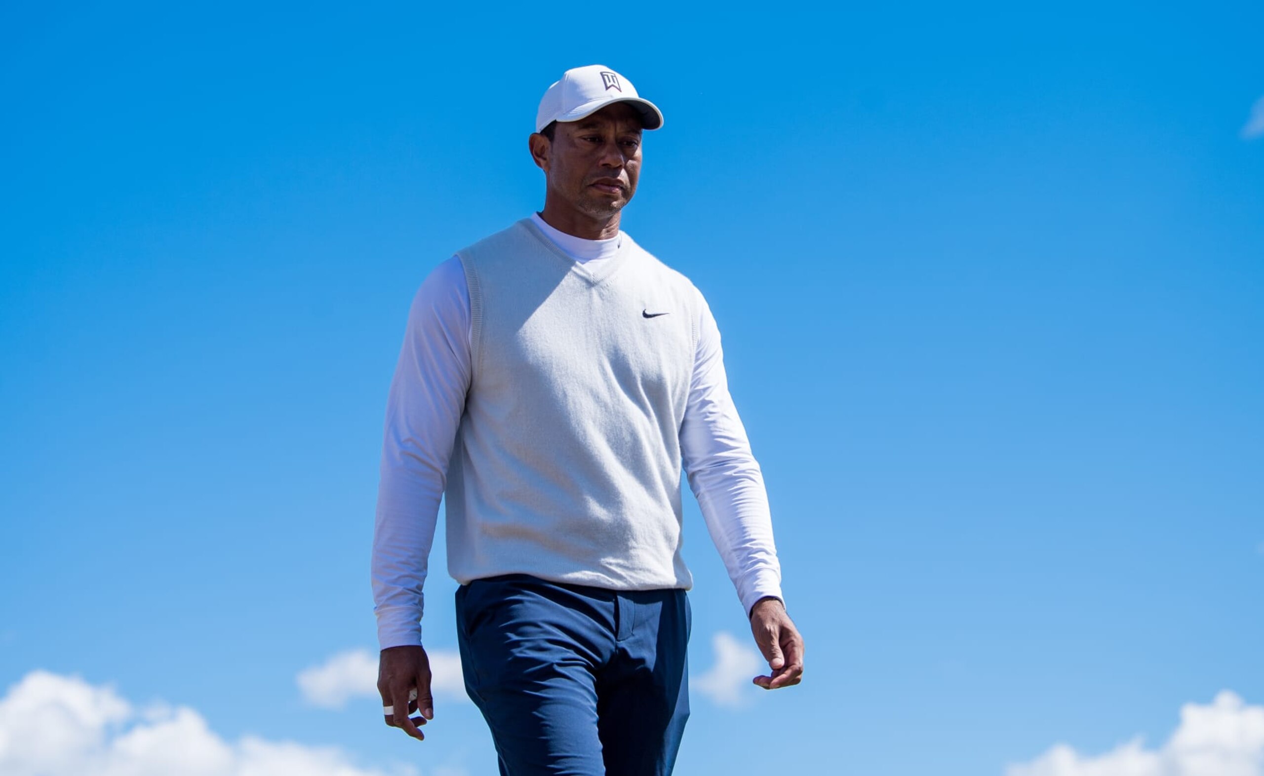 ST ANDREWS, SCOTLAND - JULY 15: Tiger Woods of the United States approaches the 17th tee during Day Two of The 150th Open at St Andrews Old Course on July 15, 2022 in St Andrews, Scotland. (Photo by Ross Parker/SNS Group via Getty Images)