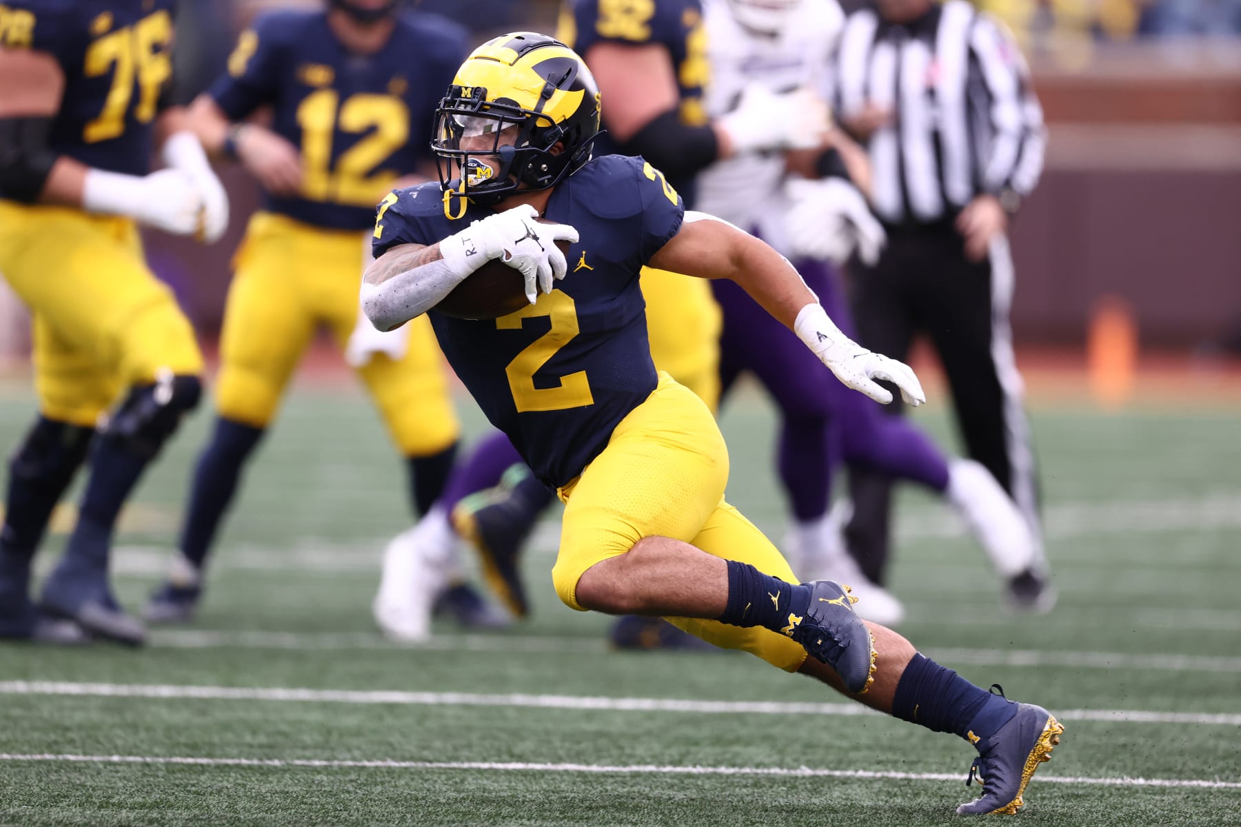 ANN ARBOR, MICHIGAN - OCTOBER 23: Blake Corum #2 of the Michigan Wolverines plays against the Northwestern Wildcats at Michigan Stadium on October 23, 2021 in Ann Arbor, Michigan. (Photo by Gregory Shamus/Getty Images)