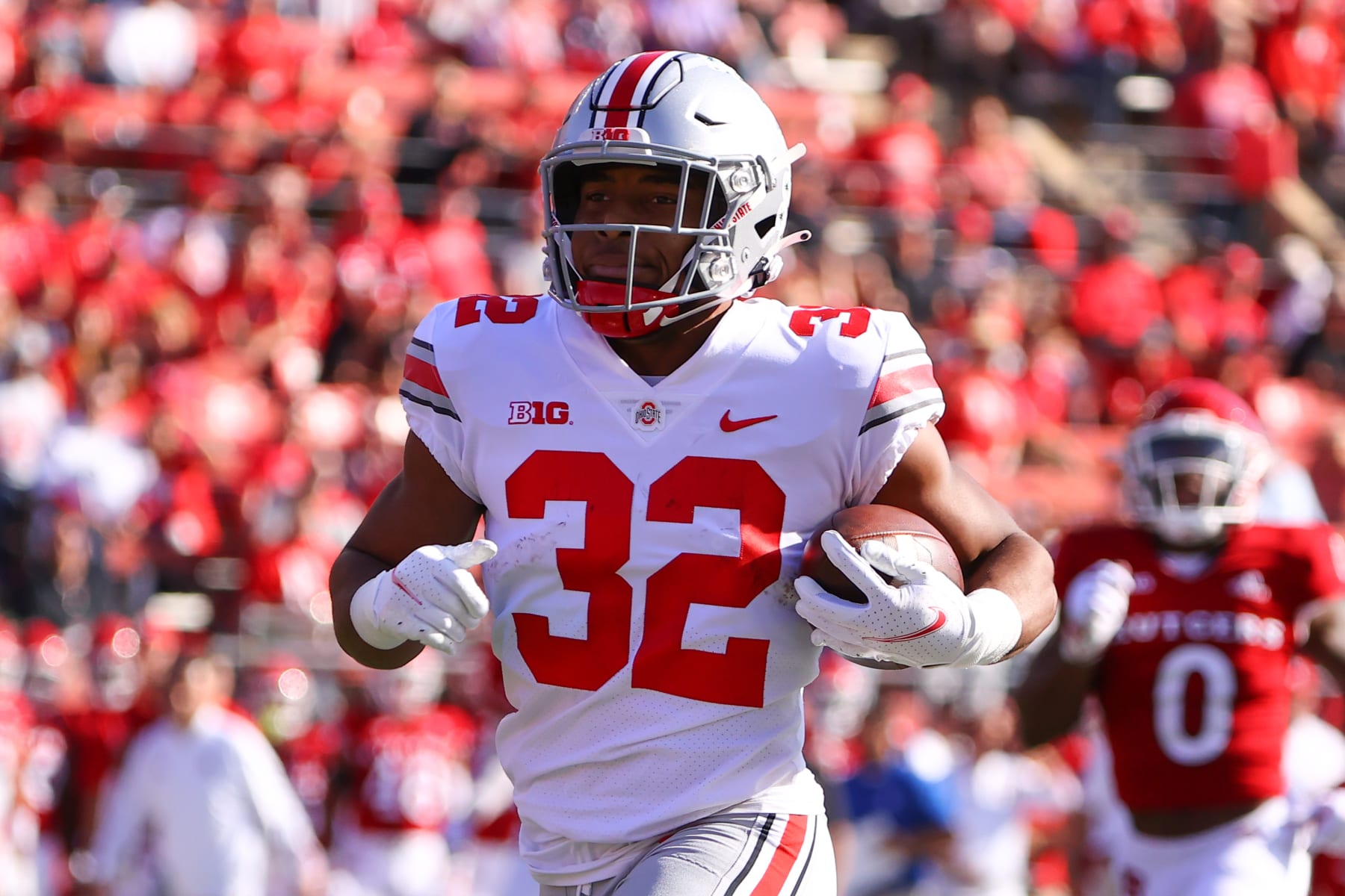 PISCATAWAY, NJ - OCTOBER 02:  Ohio State Buckeyes running back TreVeyon Henderson (32) scores a touchdown during the first quarter of the college football game between the Ohio State Buckeyes and Rutgers Scarlet Knights on October 2,2021 at SHI Stadium in Piscataway NJ.  (Photo by Rich Graessle/Icon Sportswire via Getty Images)