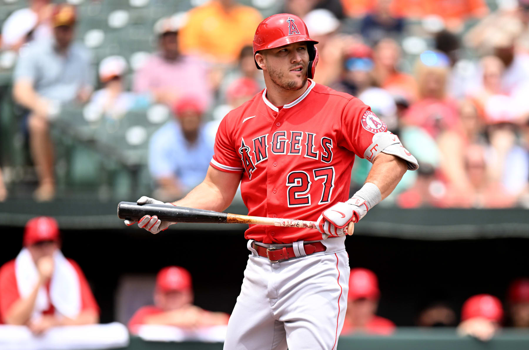BALTIMORE, MARYLAND - JULY 10: Mike Trout #27 of the Los Angeles Angels reacts after striking out against the Baltimore Orioles at Oriole Park at Camden Yards on July 10, 2022 in Baltimore, Maryland. (Photo by G Fiume/Getty Images)