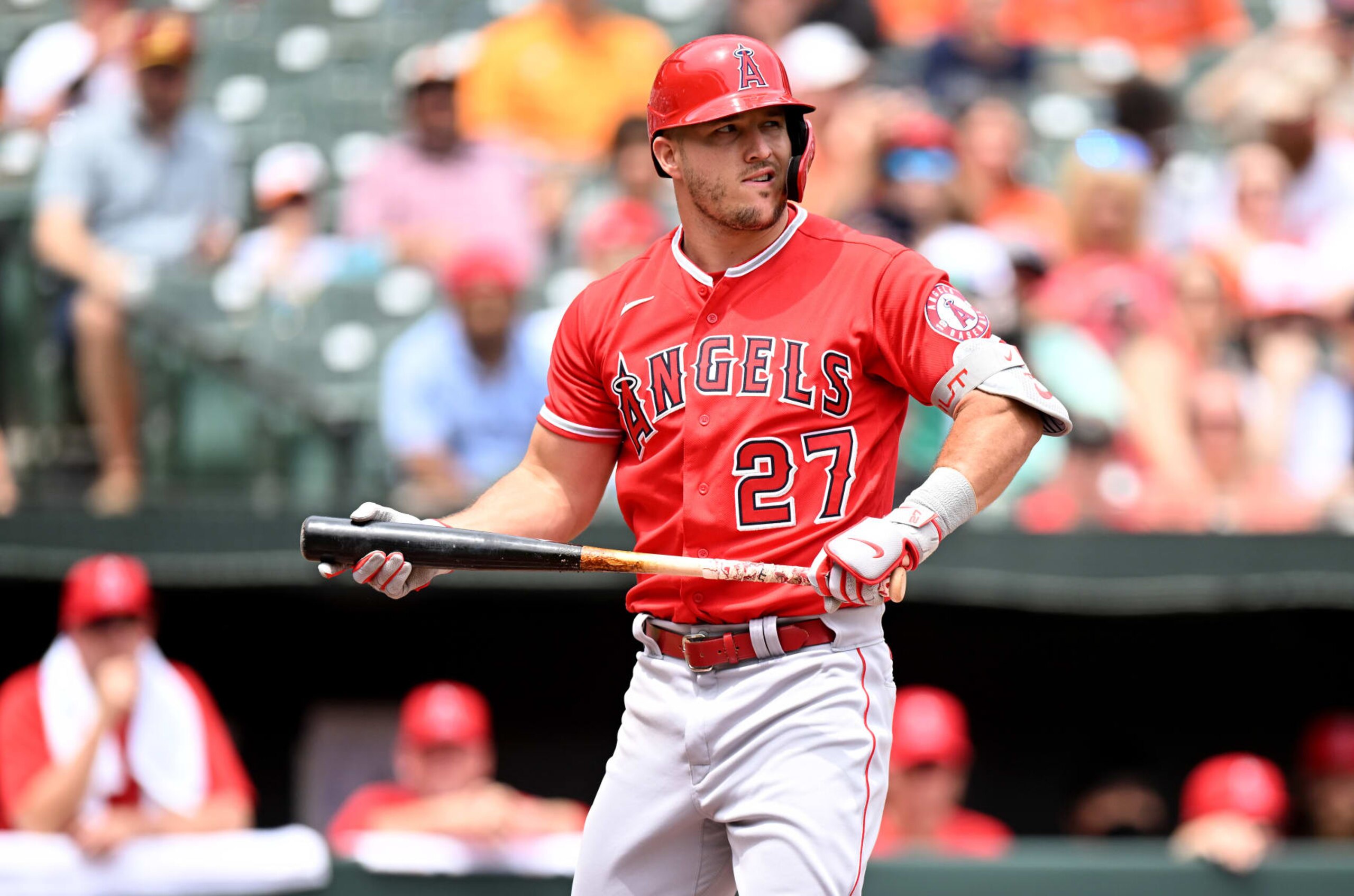 BALTIMORE, MARYLAND - JULY 10: Mike Trout #27 of the Los Angeles Angels reacts after striking out against the Baltimore Orioles at Oriole Park at Camden Yards on July 10, 2022 in Baltimore, Maryland. (Photo by G Fiume/Getty Images)
