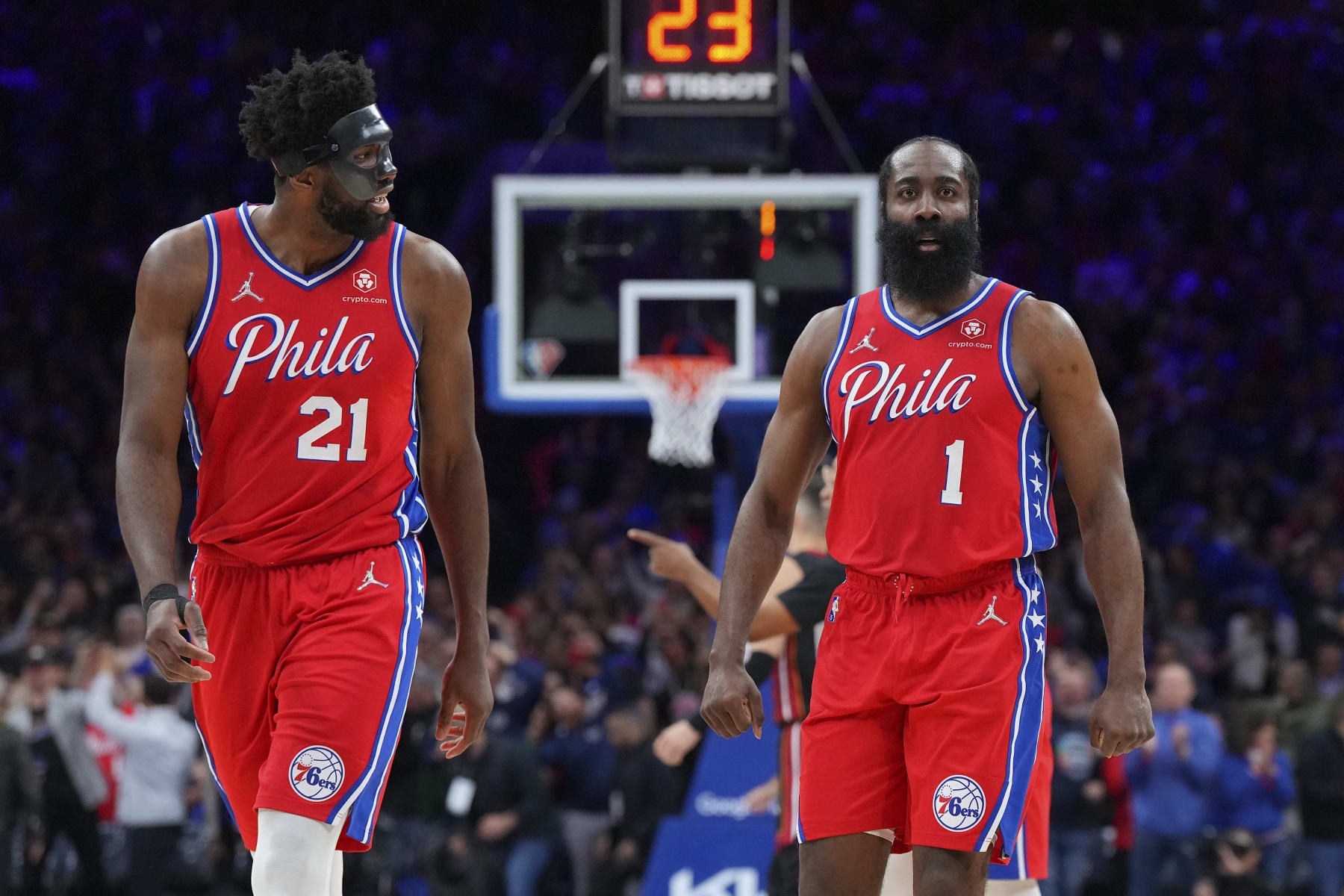PHILADELPHIA, PA - MAY 08: James Harden #1 and Joel Embiid #21 of the Philadelphia 76ers react against the Miami Heat during Game Four of the 2022 NBA Playoffs Eastern Conference Semifinals at the Wells Fargo Center on May 8, 2022 in Philadelphia, Pennsylvania. The 76ers defeated the Heat 116-108. NOTE TO USER: User expressly acknowledges and agrees that, by downloading and or using this photograph, User is consenting to the terms and conditions of the Getty Images License Agreement. (Photo by Mitchell Leff/Getty Images)