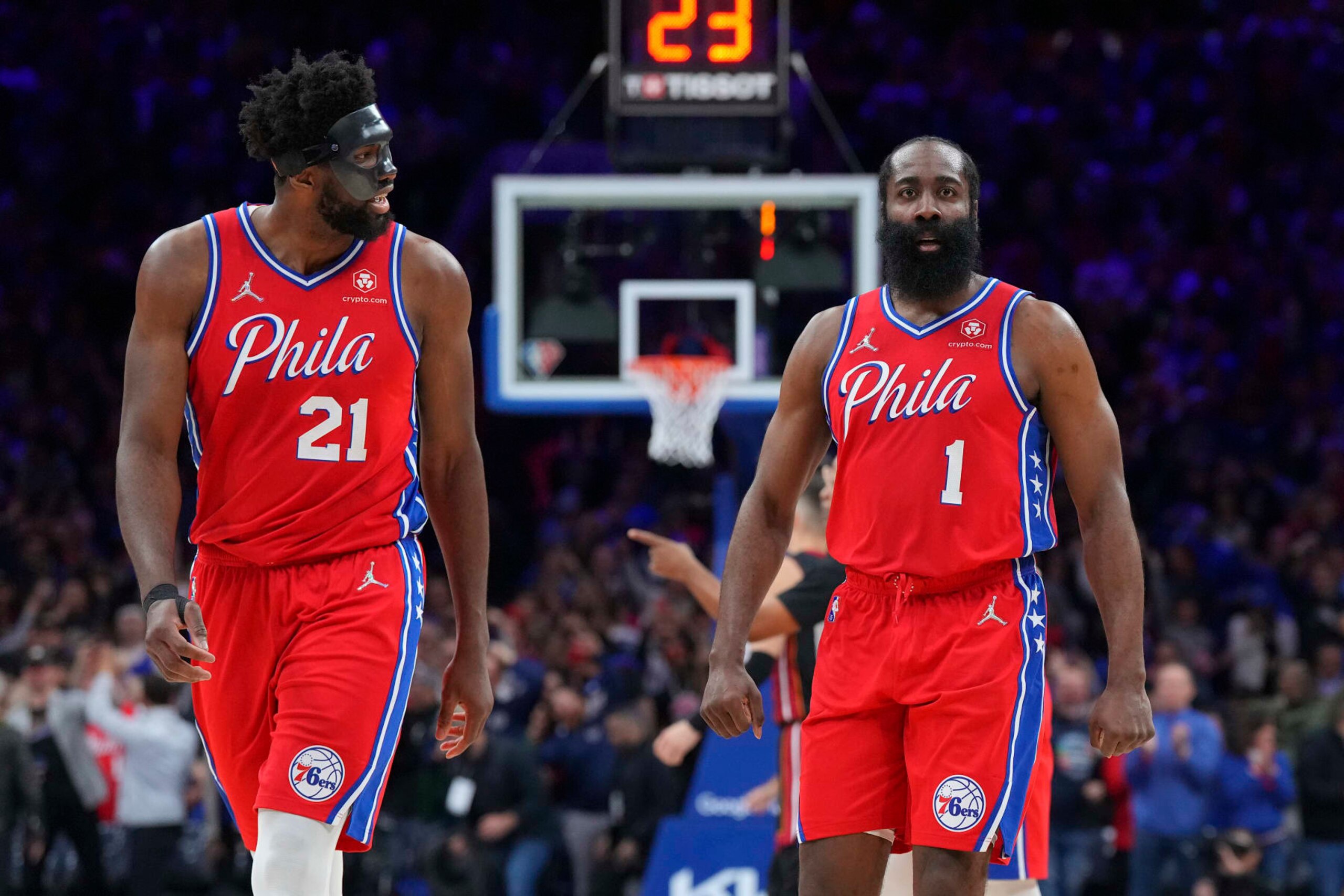 PHILADELPHIA, PA - MAY 08: James Harden #1 and Joel Embiid #21 of the Philadelphia 76ers react against the Miami Heat during Game Four of the 2022 NBA Playoffs Eastern Conference Semifinals at the Wells Fargo Center on May 8, 2022 in Philadelphia, Pennsylvania. The 76ers defeated the Heat 116-108. NOTE TO USER: User expressly acknowledges and agrees that, by downloading and or using this photograph, User is consenting to the terms and conditions of the Getty Images License Agreement. (Photo by Mitchell Leff/Getty Images)