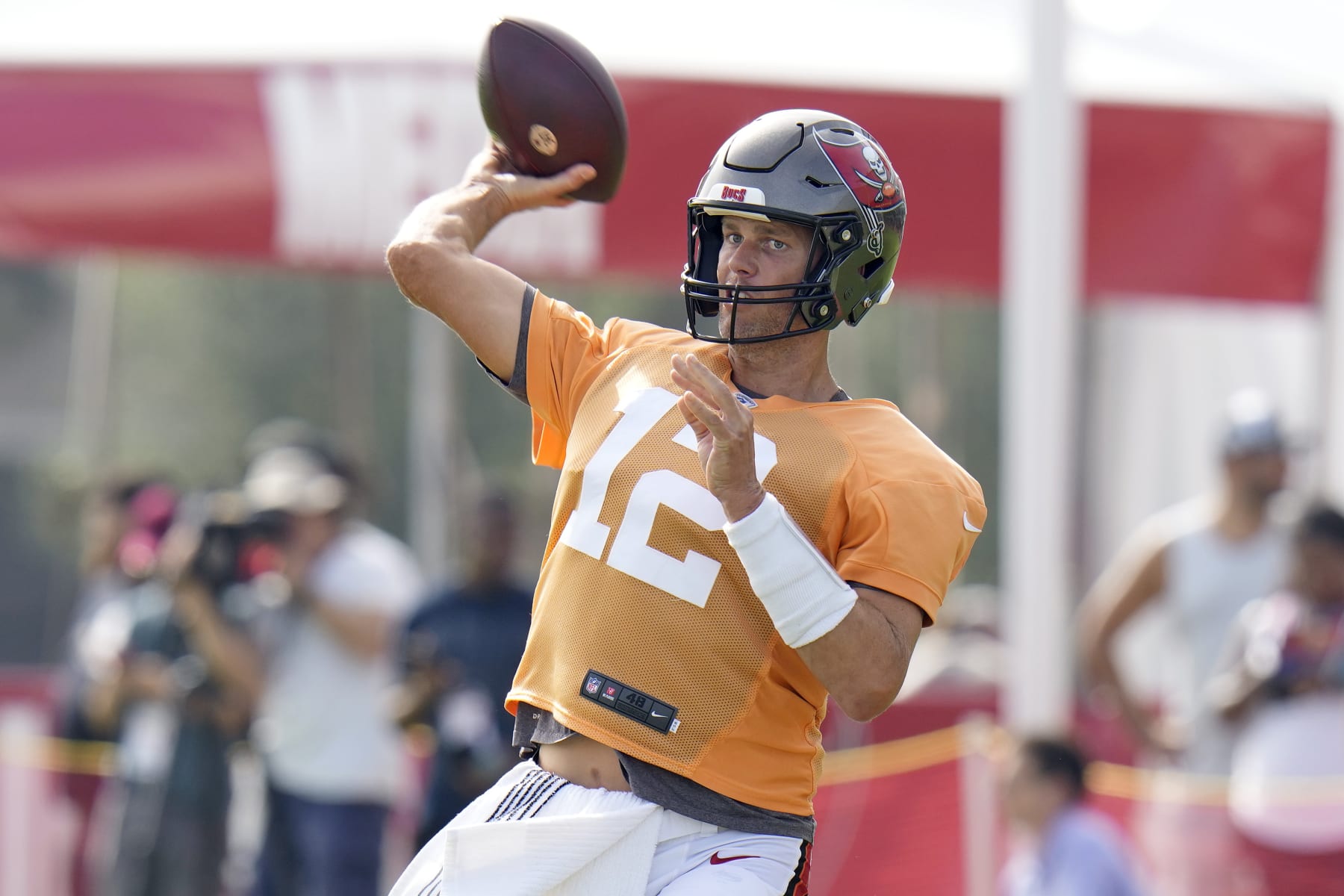 Tampa Bay Buccaneers quarterback Tom Brady throw during an NFL football training camp practice Wednesday, Aug. 10, 2022, in Tampa, Fla. (AP Photo/Chris O'Meara)