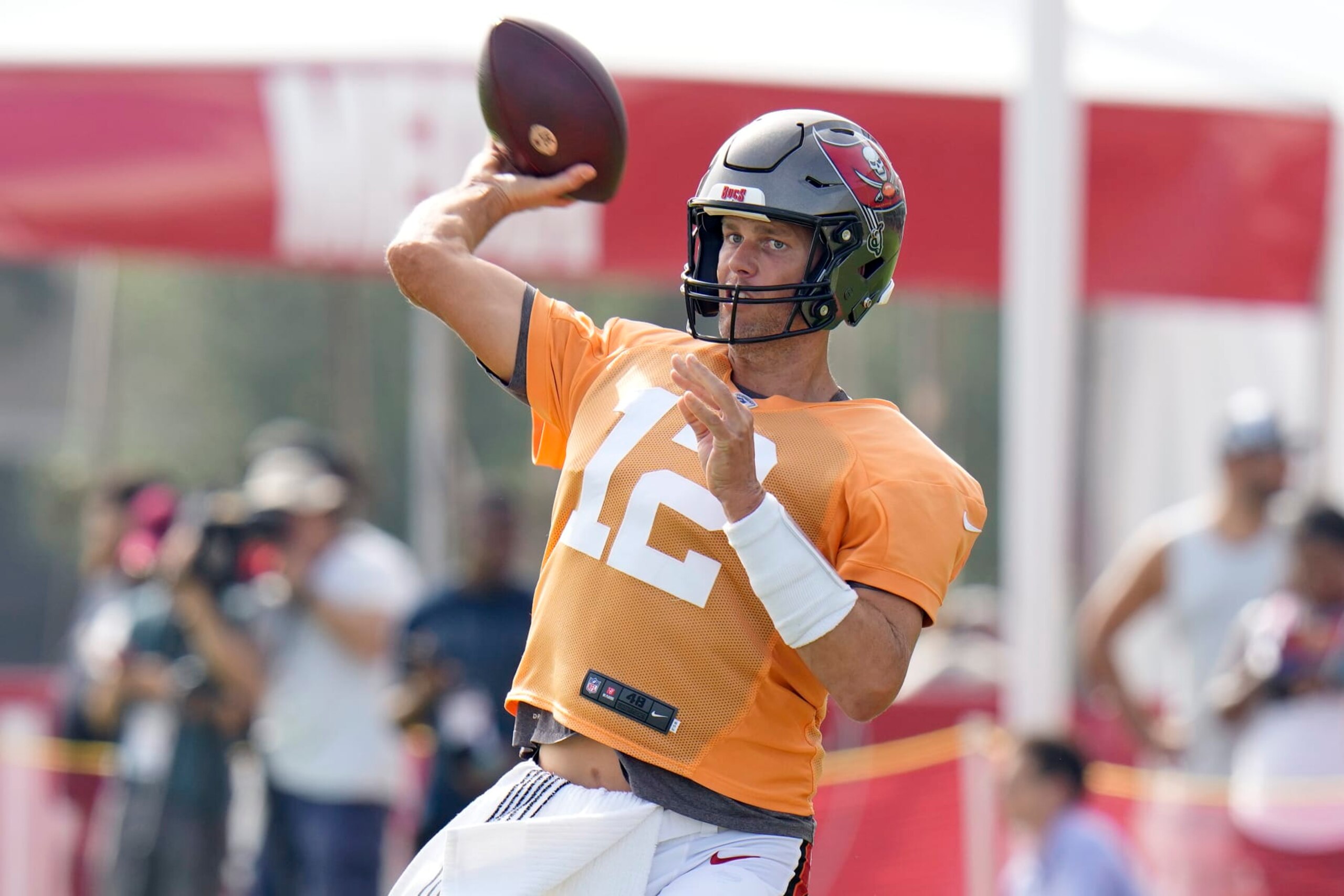 Tampa Bay Buccaneers quarterback Tom Brady throw during an NFL football training camp practice Wednesday, Aug. 10, 2022, in Tampa, Fla. (AP Photo/Chris O'Meara)