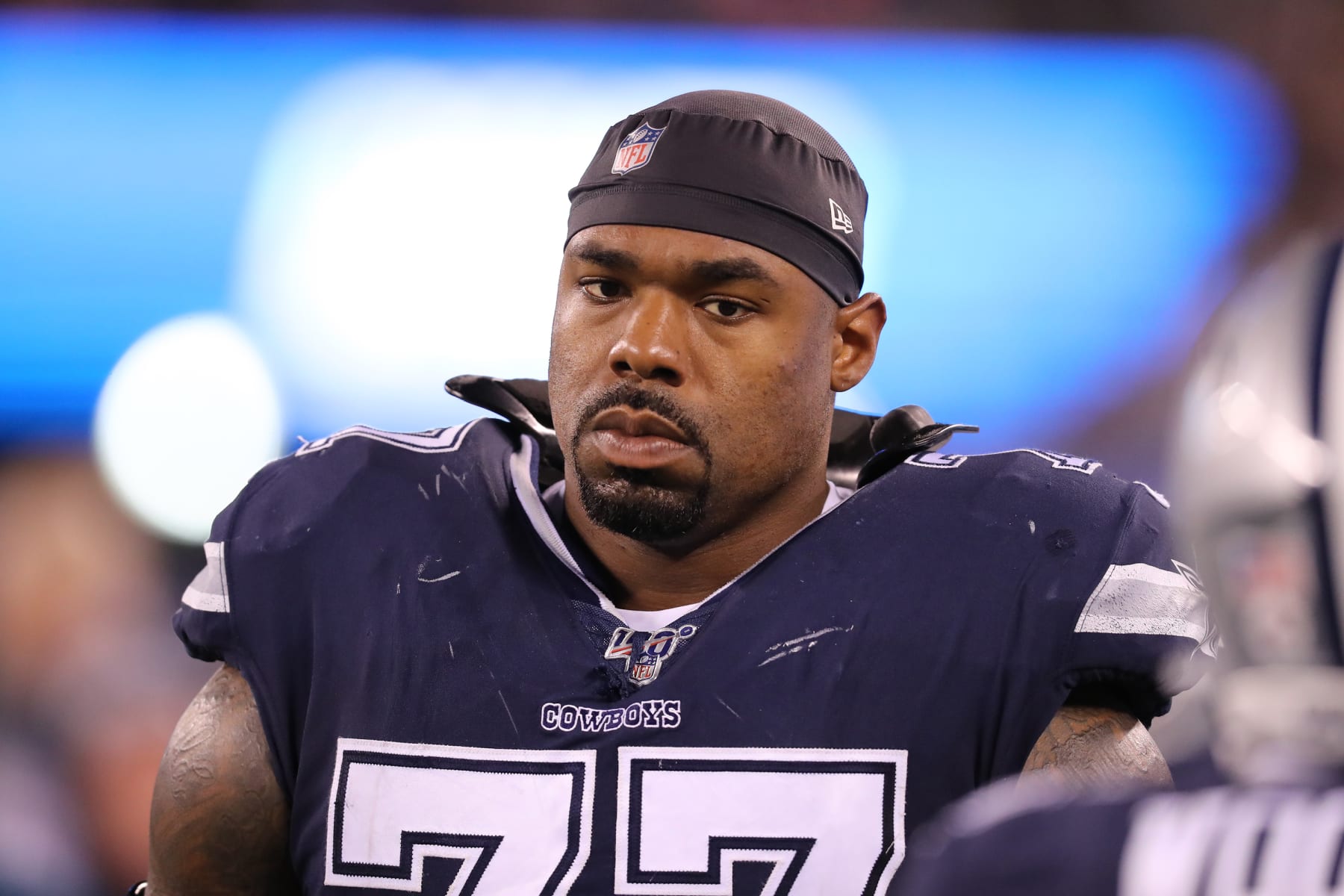 EAST RUTHERFORD, NEW JERSEY - NOVEMBER 04: Tackle Tyron Smith #77 of the Dallas Cowboys follows the action against the New York Giants in the second half at MetLife Stadium on November 04, 2019 in East Rutherford, New Jersey.The Dallas Cowboys defeated the New York Giants 37-18. (Photo by Al Pereira/Getty Images)